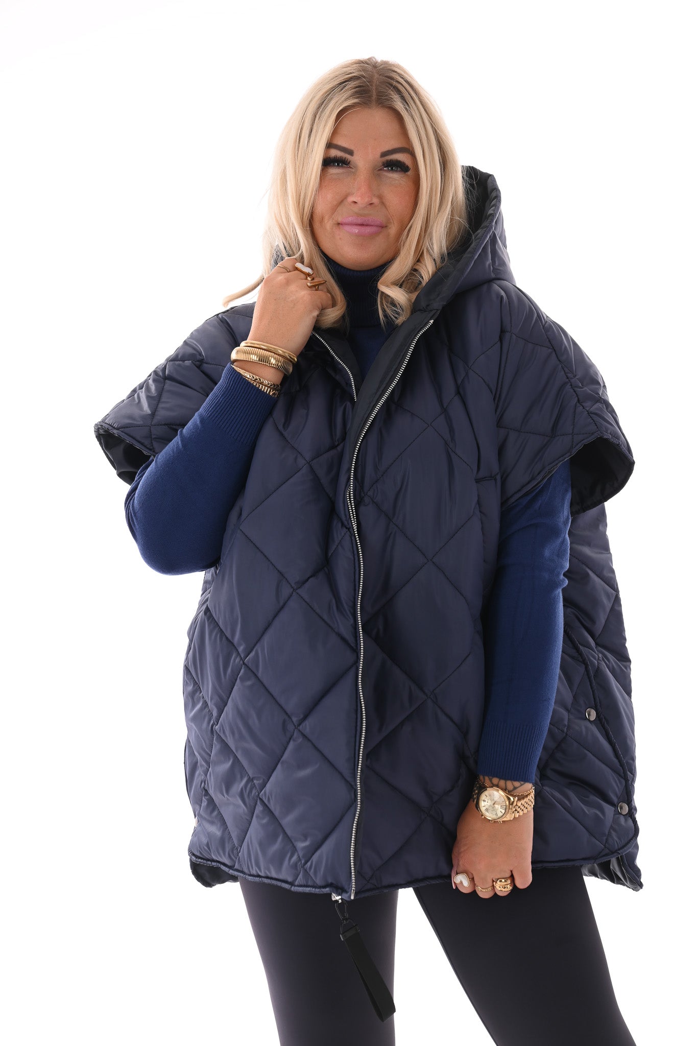 Gewatteerde ponchojas met capuchon marineblauw