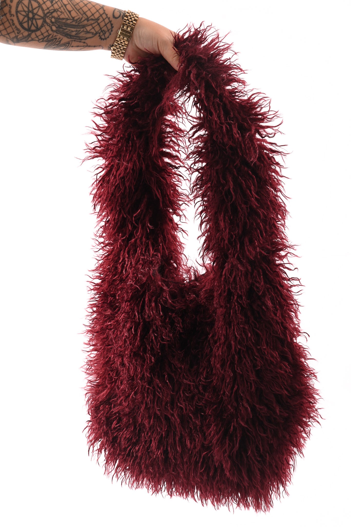 Wavy faux fur schoudertas bordeaux