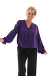Top v-hals glitter trompetmouwen met ketting paars
