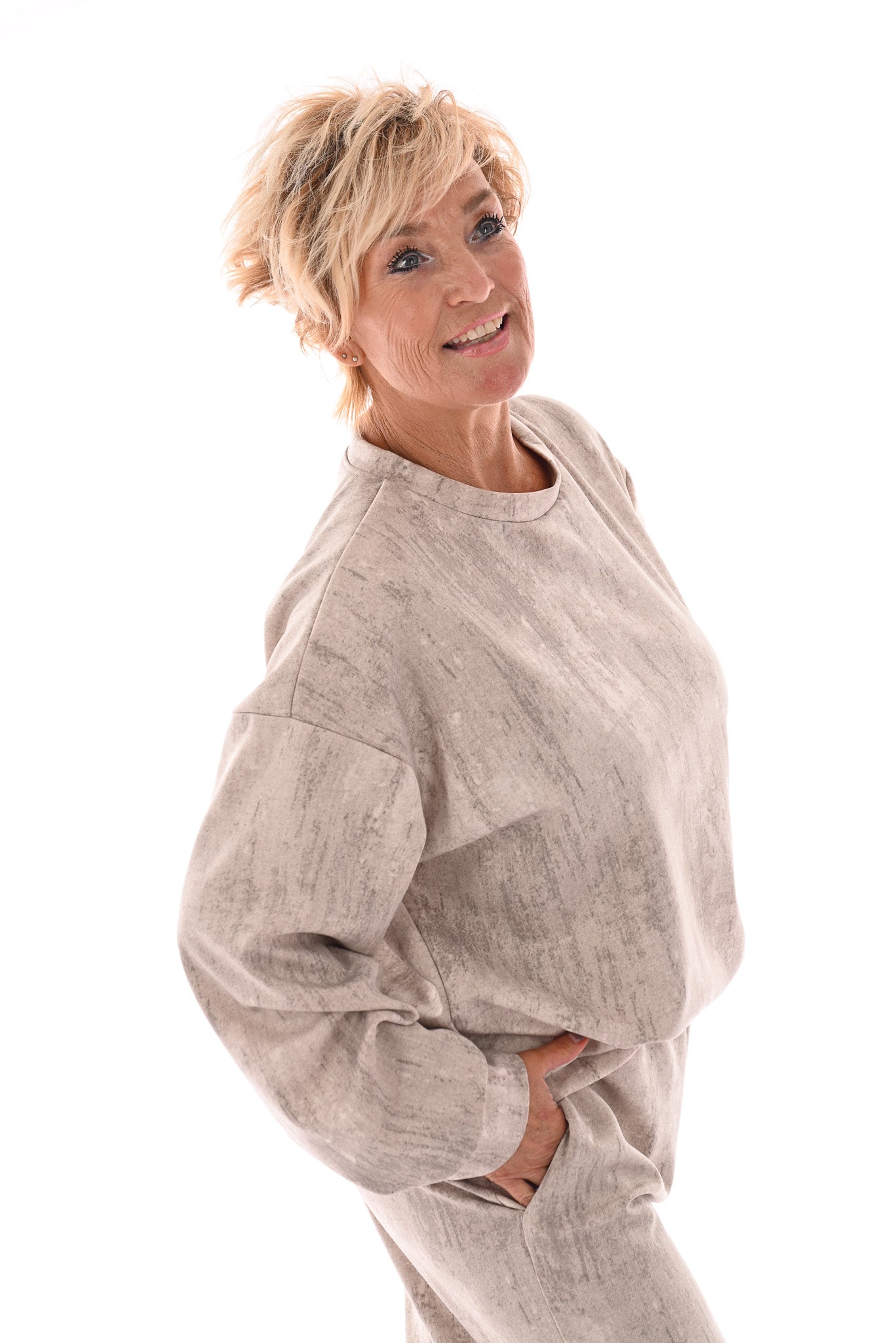 Tweedelig pak gouden vegen beige