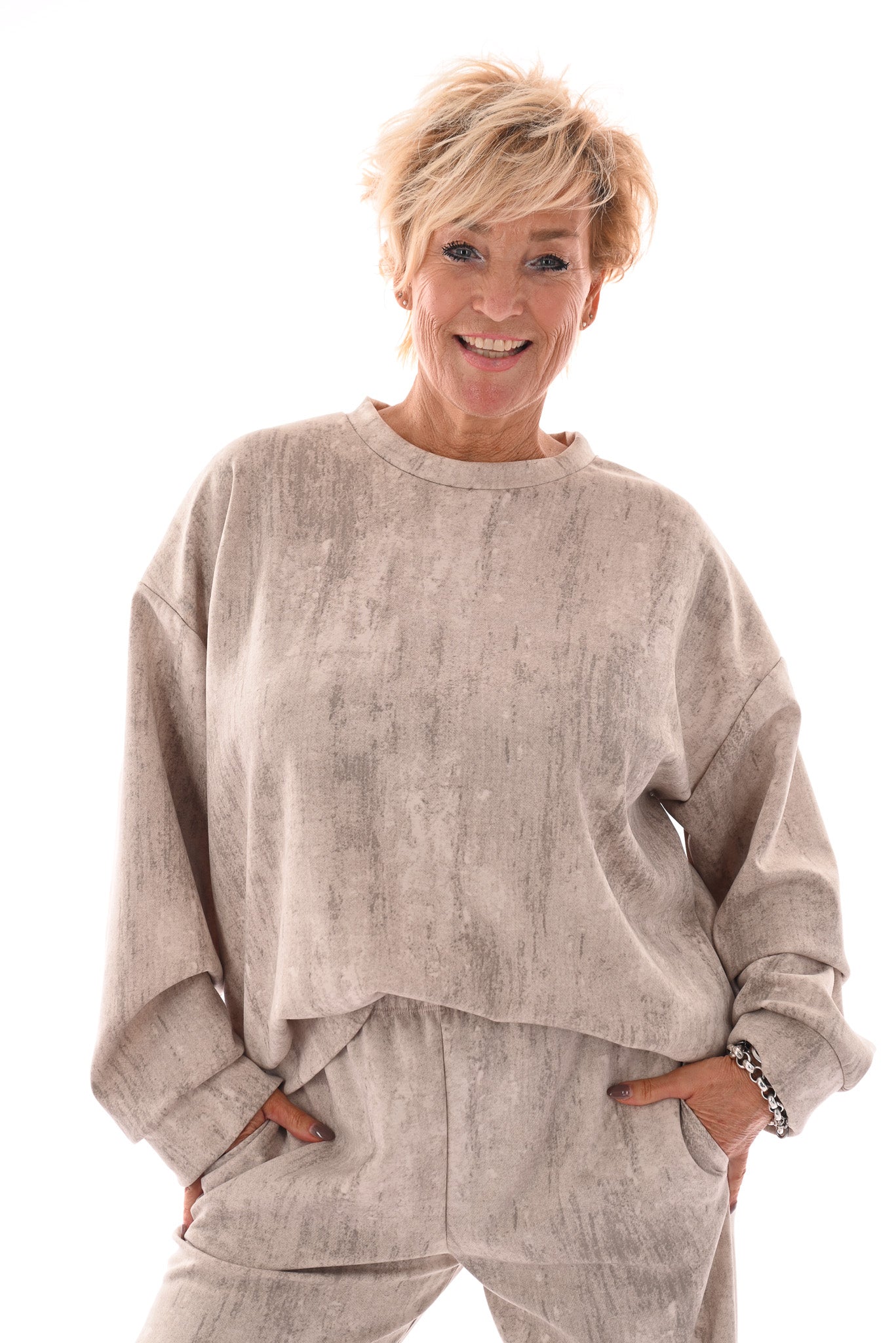 Tweedelig pak gouden vegen beige