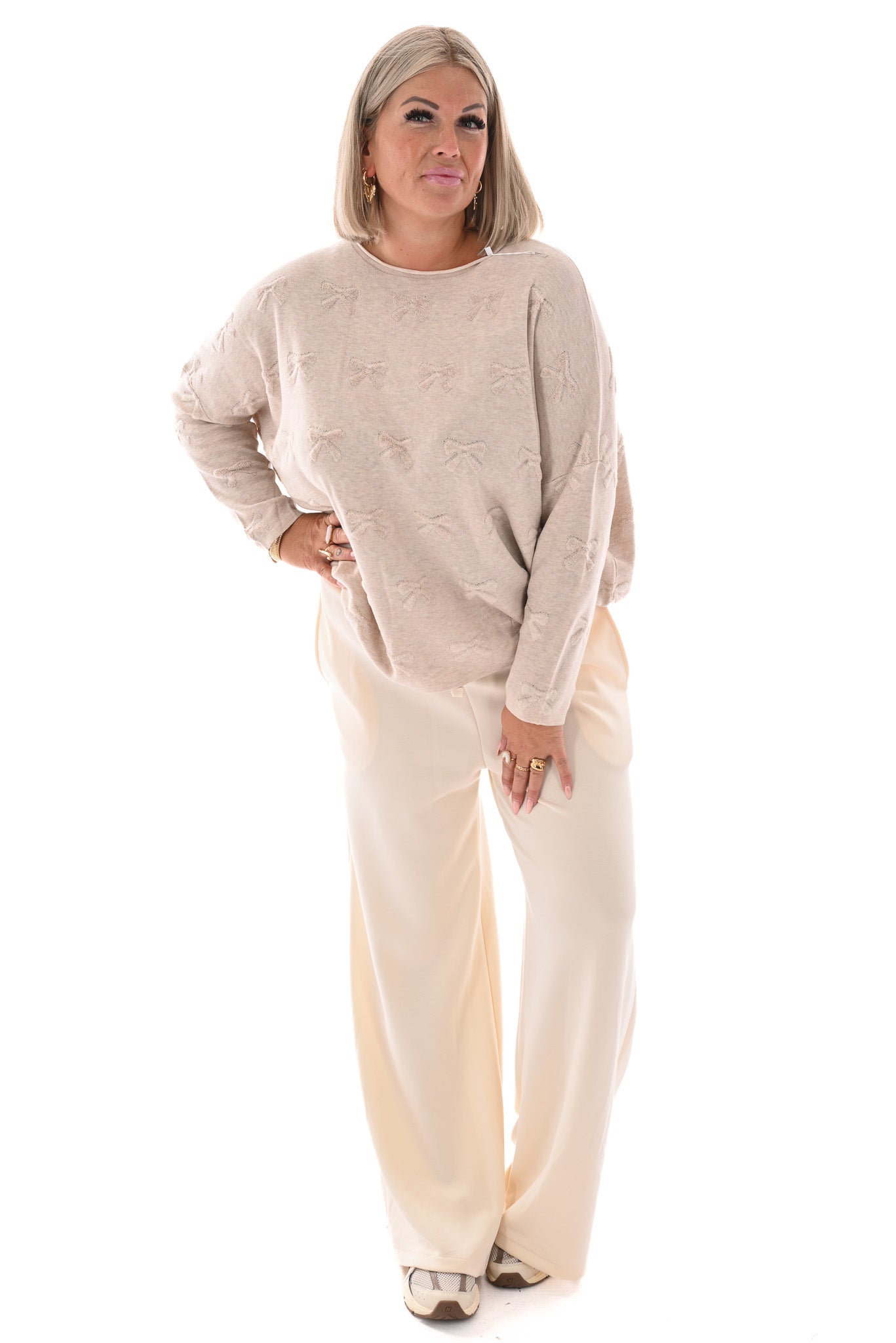 Trui strikjes beige