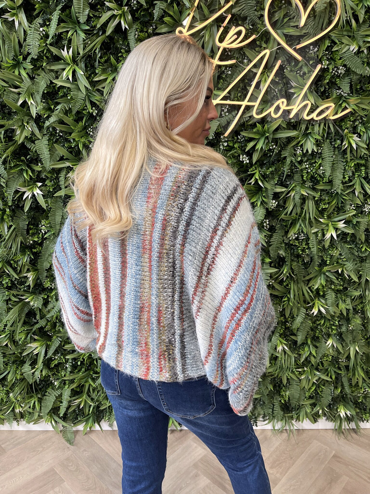 Gebreide trui met knoop blauw/brique