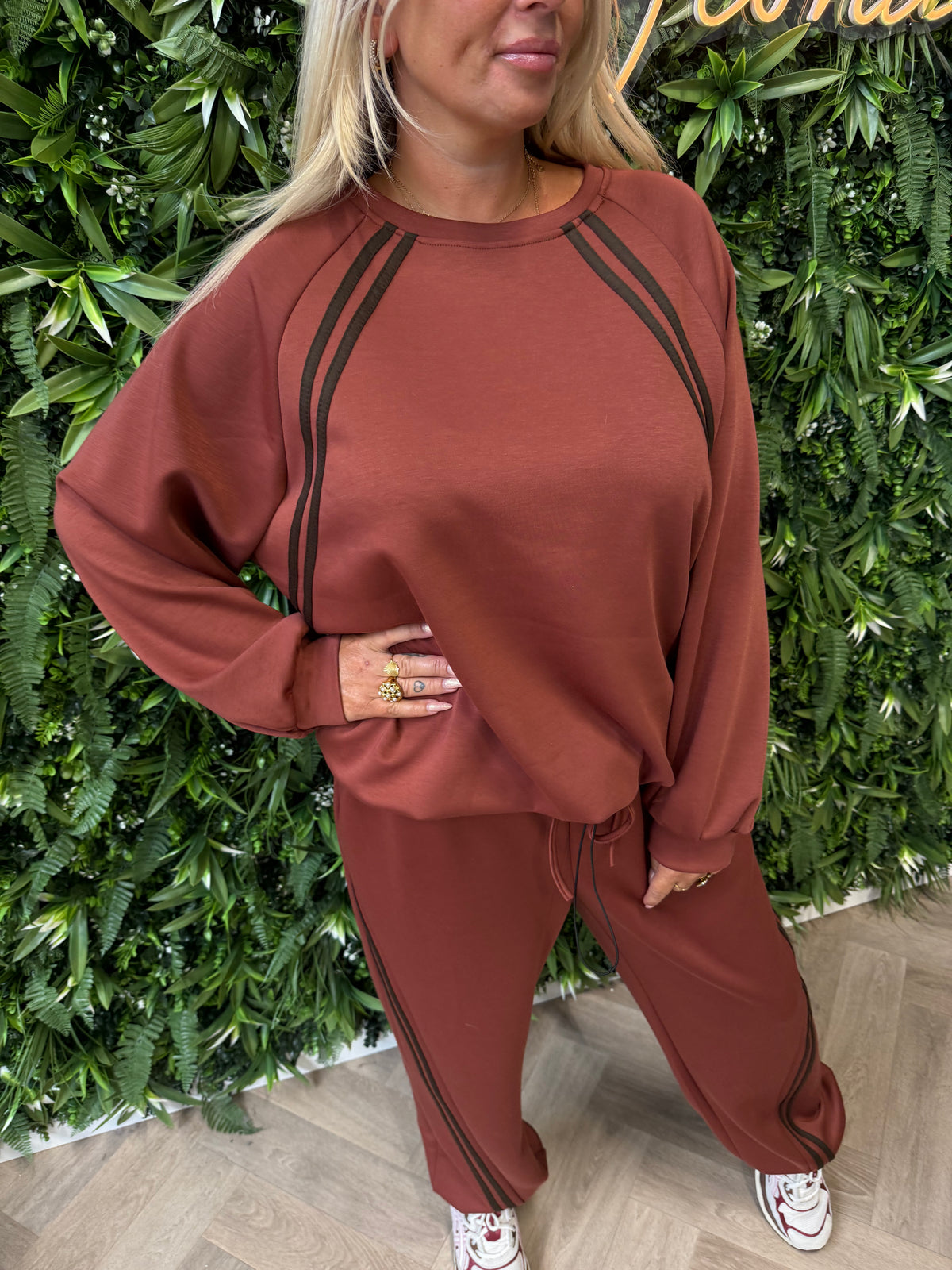 Joggingspak elastieken onderkant met bies terracotta