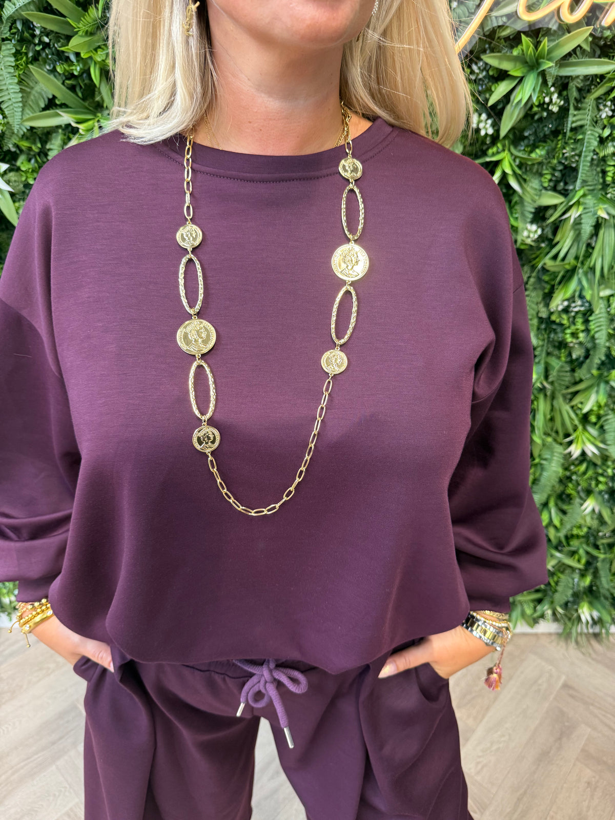 Lange stainless steel ketting met munt hangers