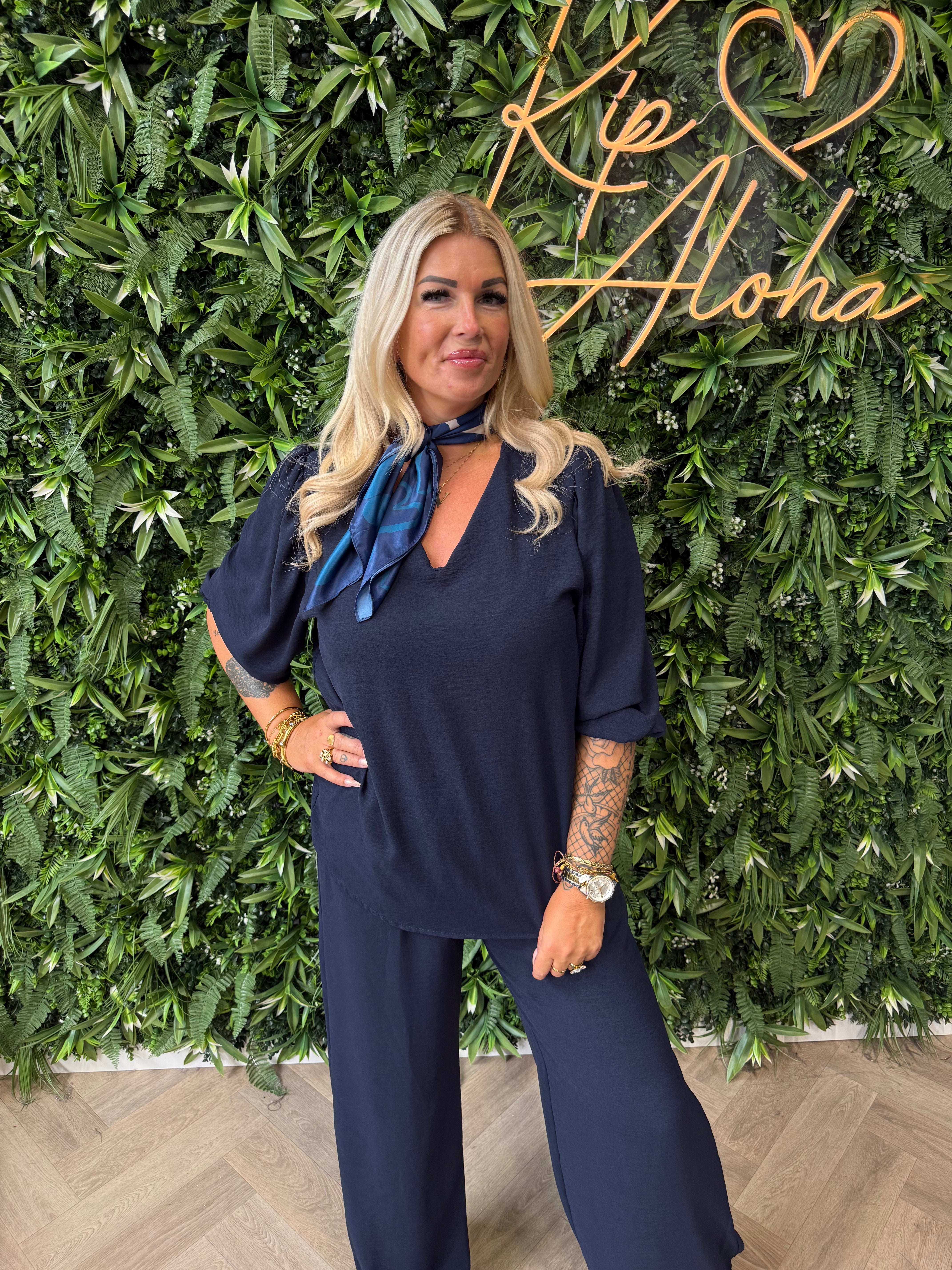 Tweedelig pak 3/4e pofmouwen marineblauw