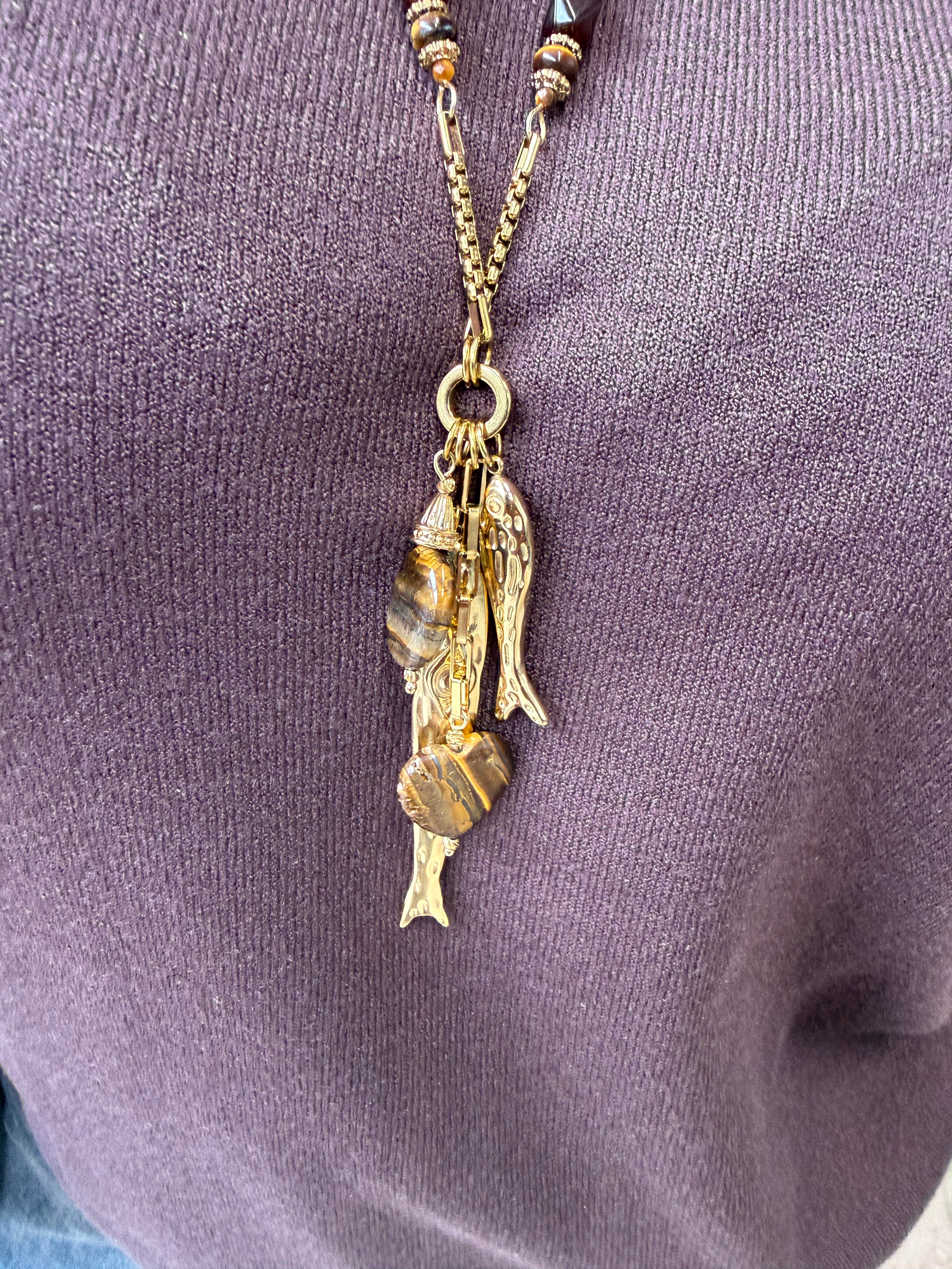 Lange stainless steel ketting met visjes goud
