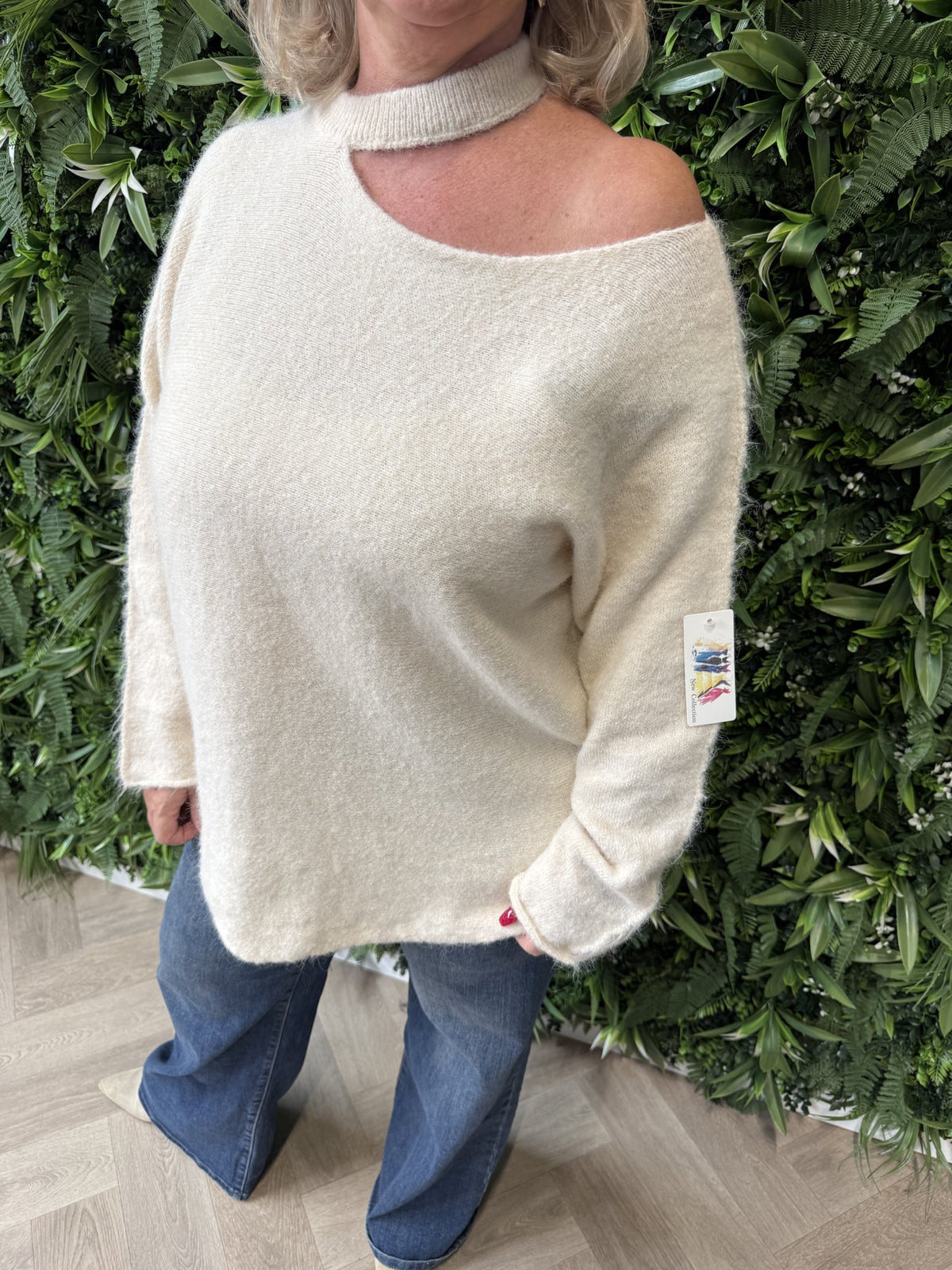 Trui off-shoulder hals detail creme