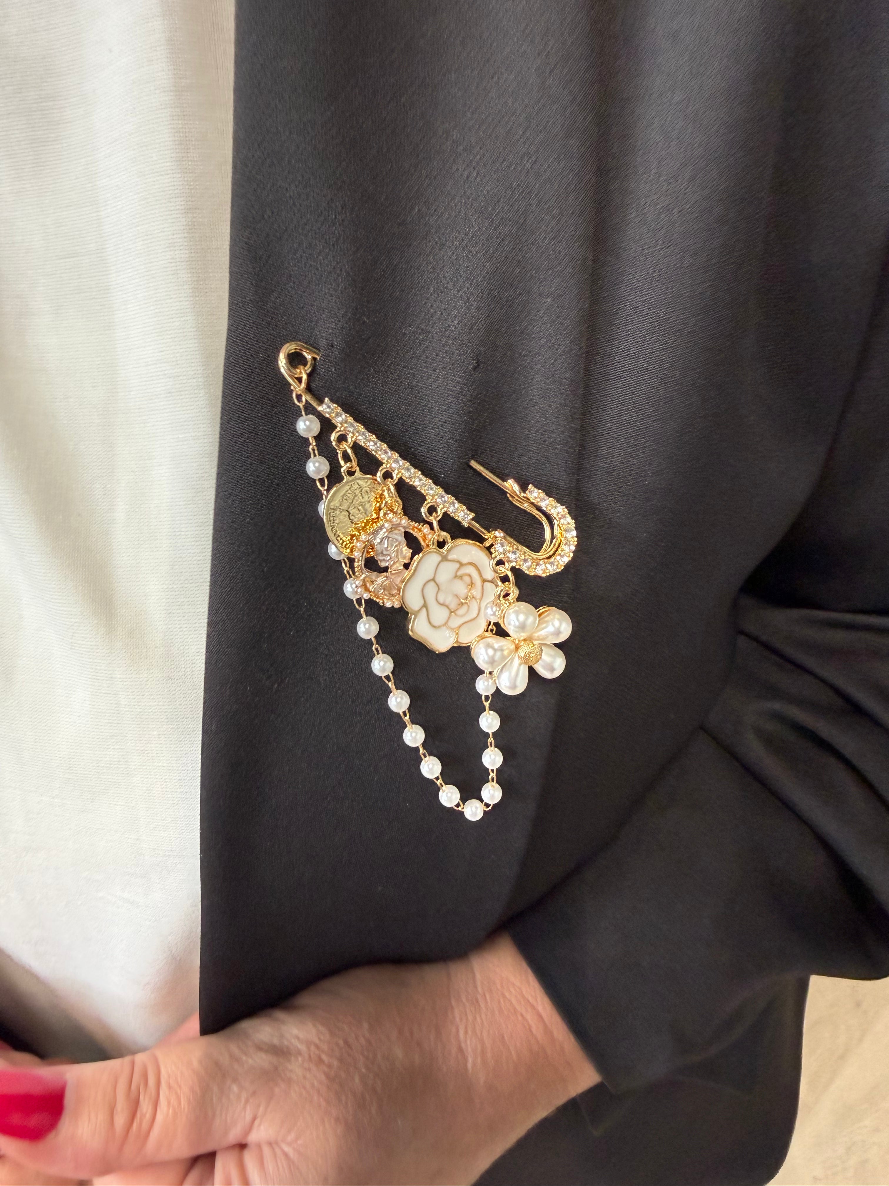 Broche met parels en munt goud