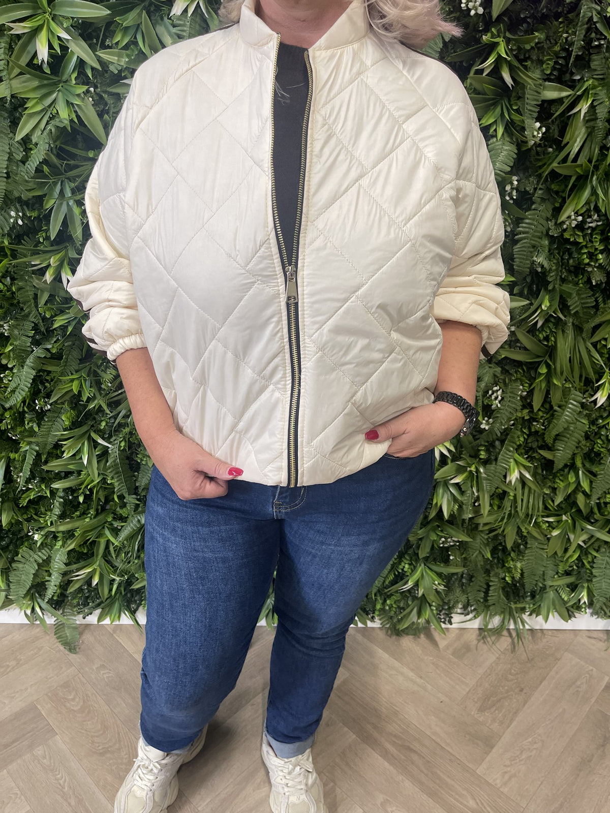 Puffer jas met bies beige