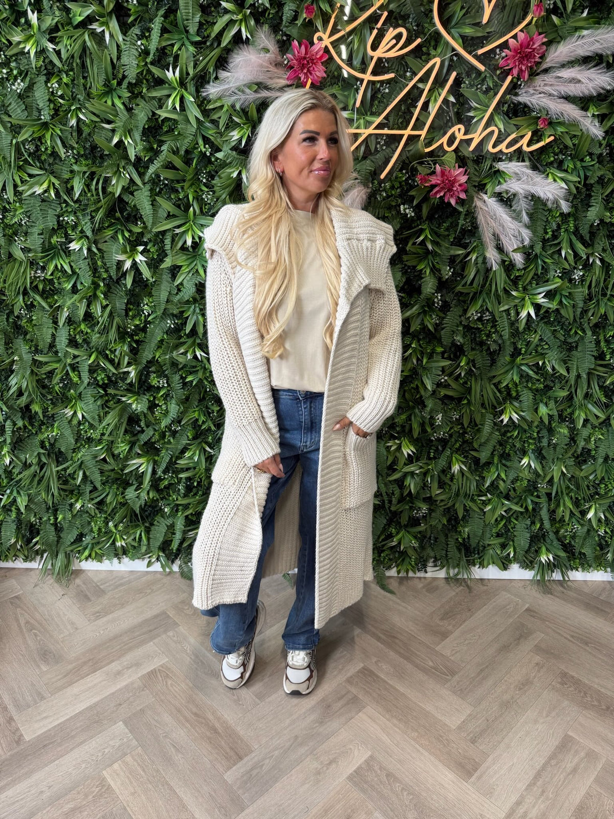 Lang gebreid vest met kraag beige