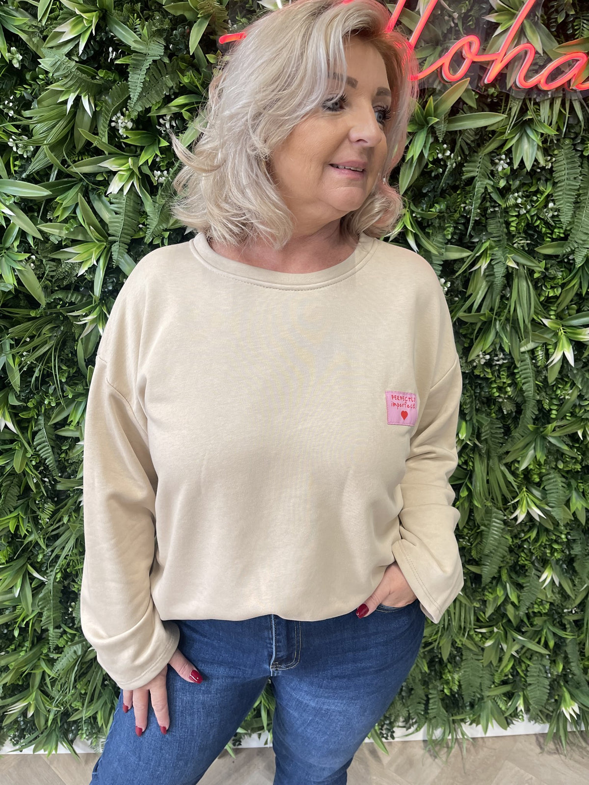 Sweater wijde mouwen applicatie uni beige
