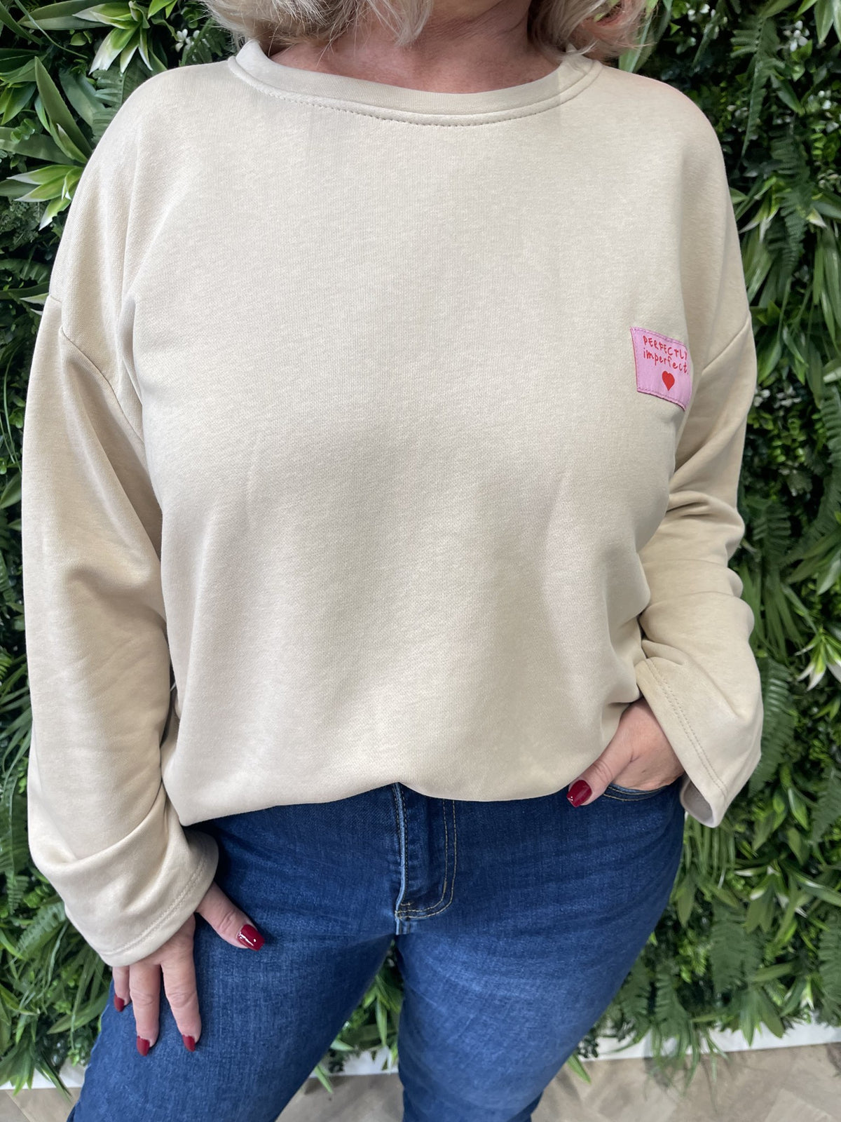 Sweater wijde mouwen applicatie uni beige