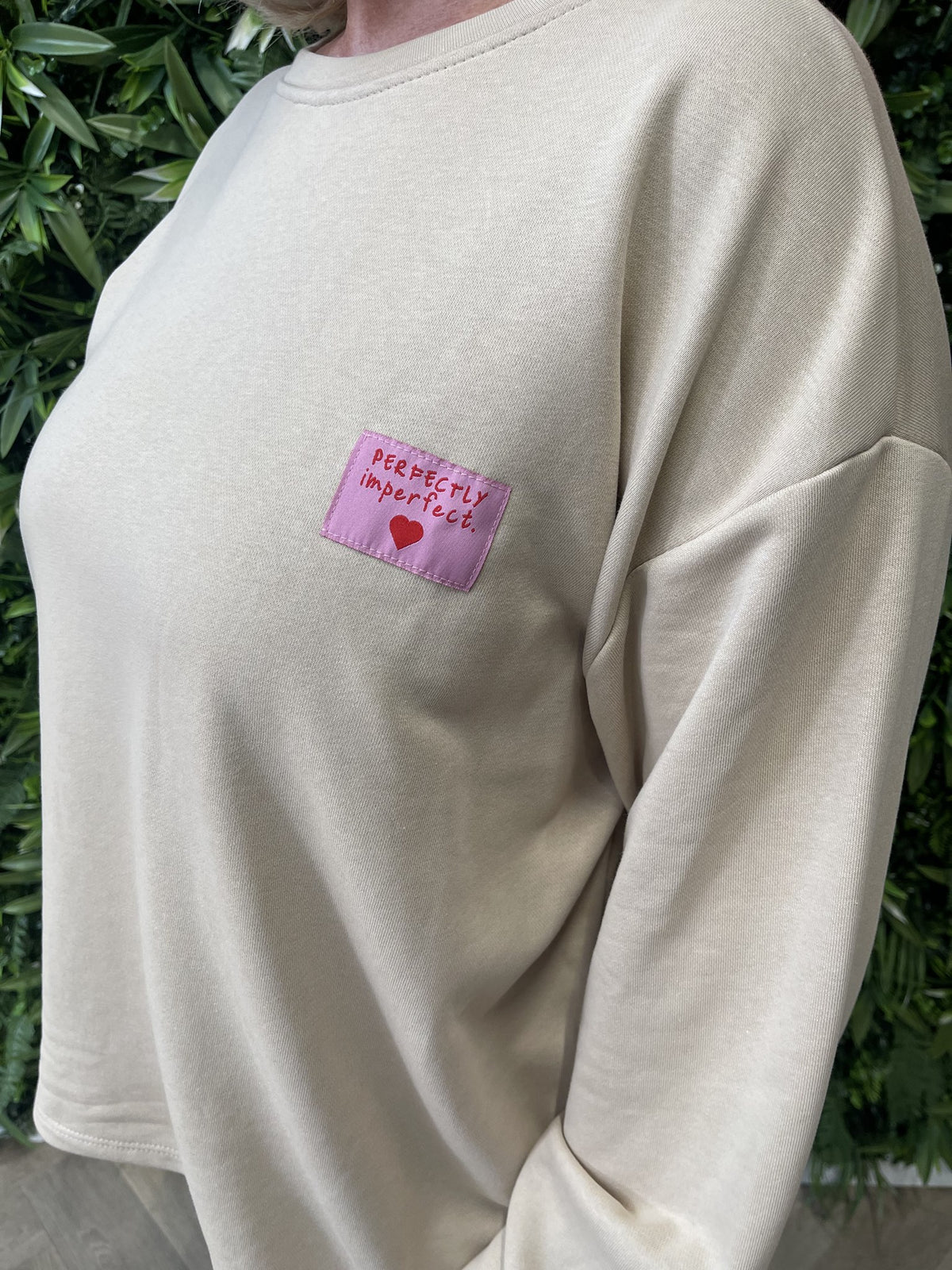 Sweater wijde mouwen applicatie uni beige