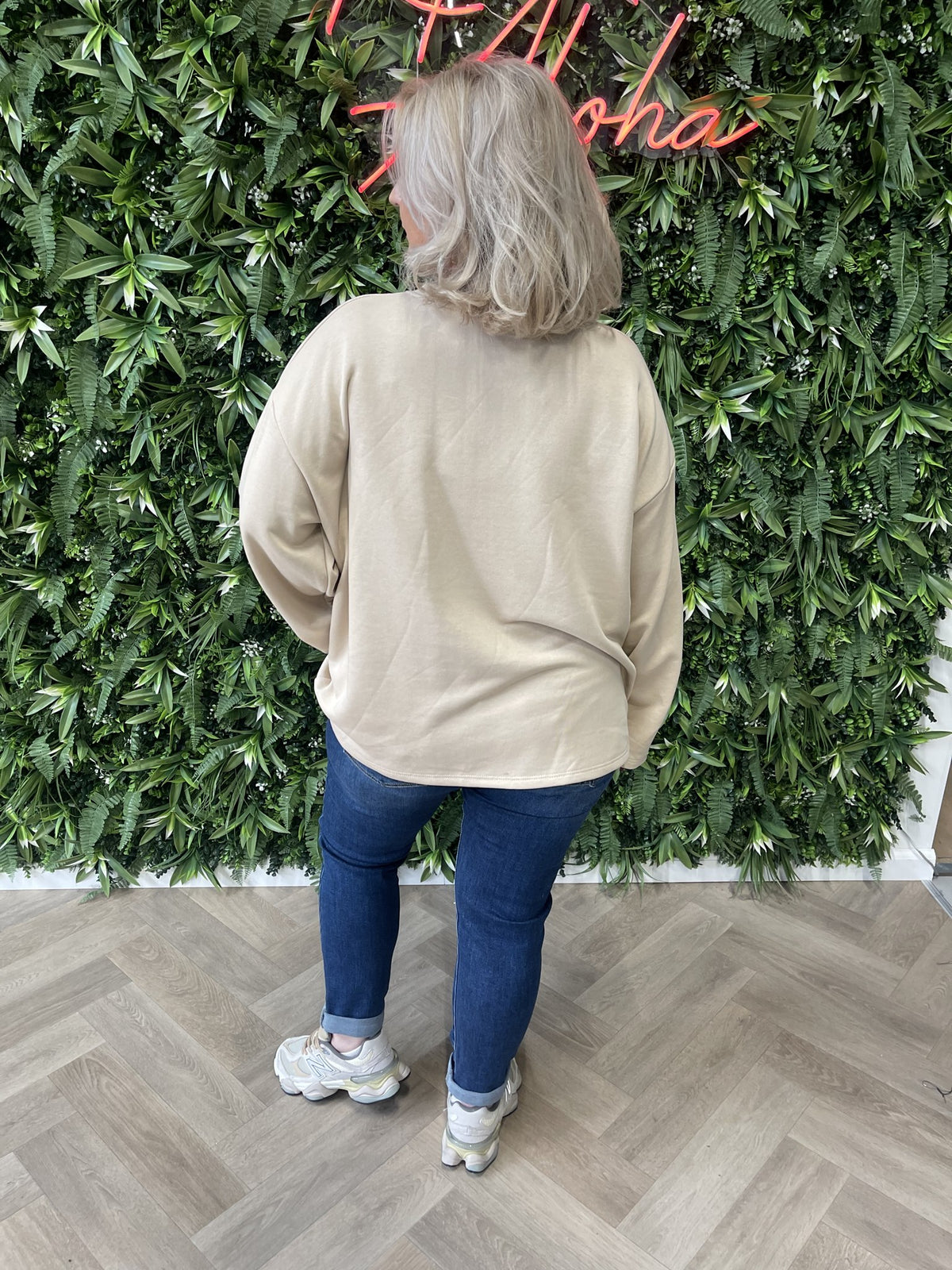Sweater wijde mouwen applicatie uni beige