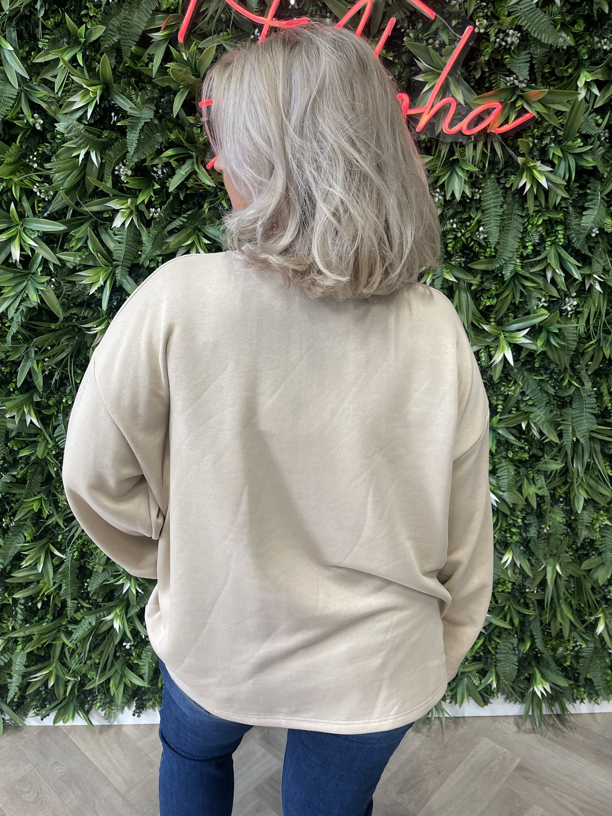 Sweater wijde mouwen applicatie uni beige