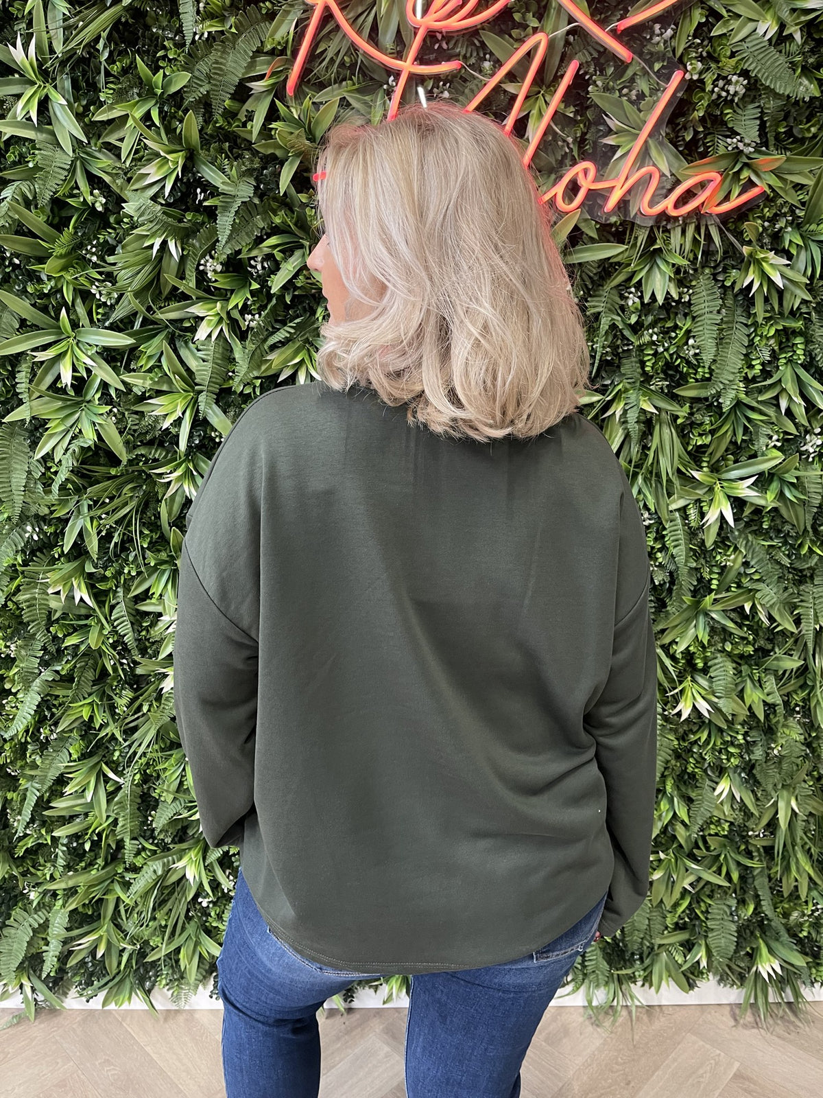 Sweater wijde mouwen applicatie uni donkergroen