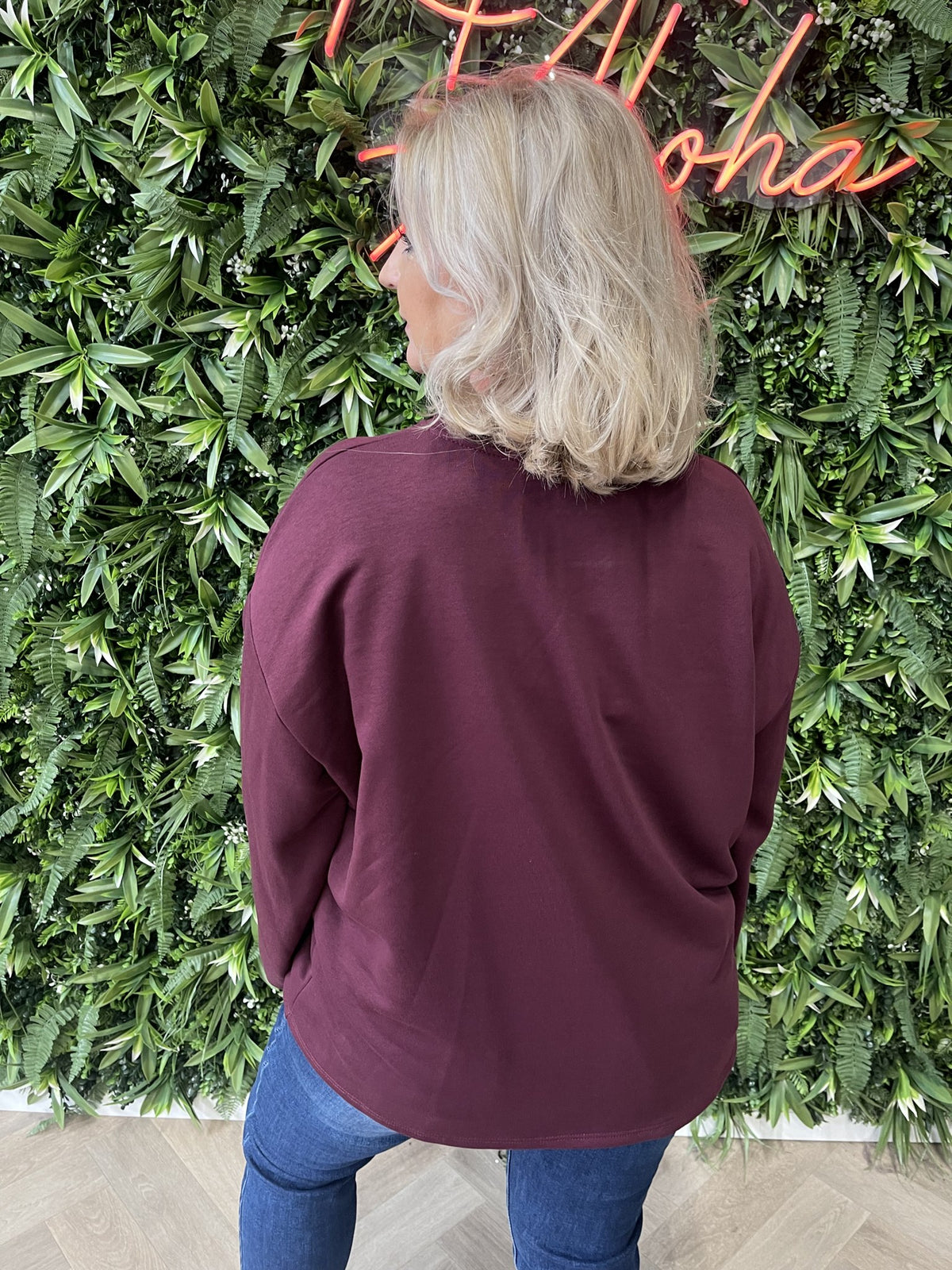 Sweater wijde mouwen applicatie uni aubergine