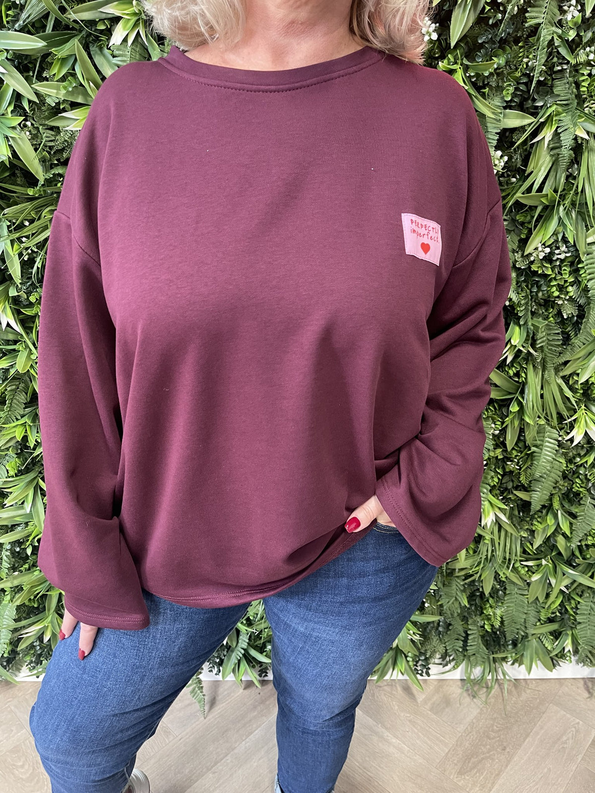 Sweater wijde mouwen applicatie uni aubergine