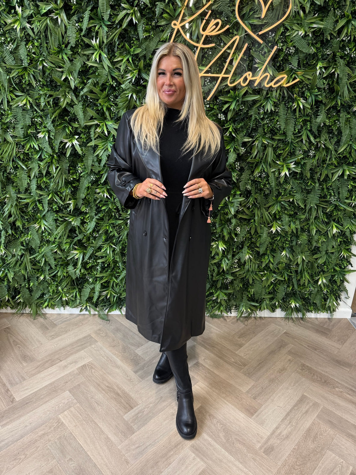 Manteljas leatherlook zwart