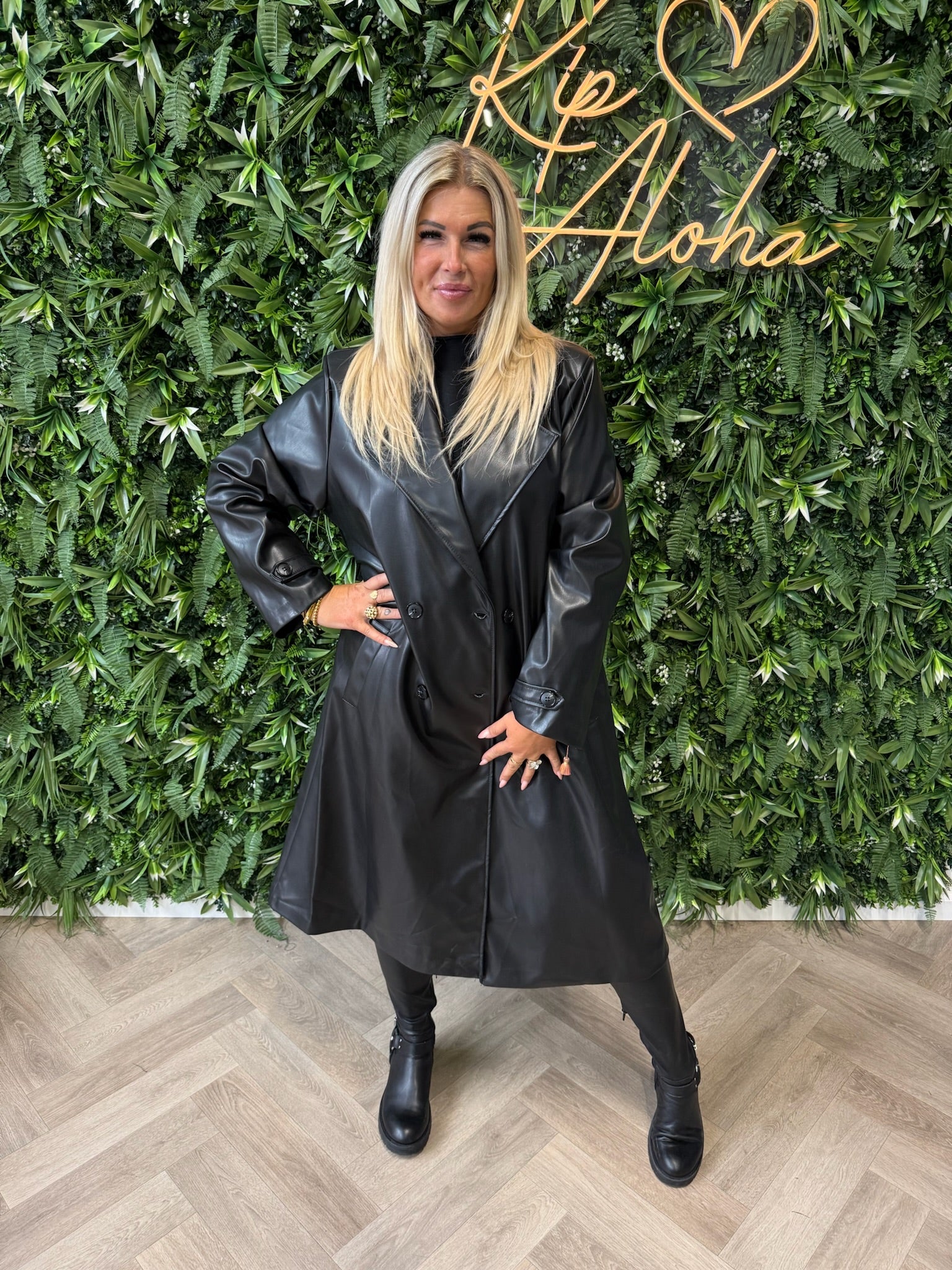 Manteljas leatherlook zwart