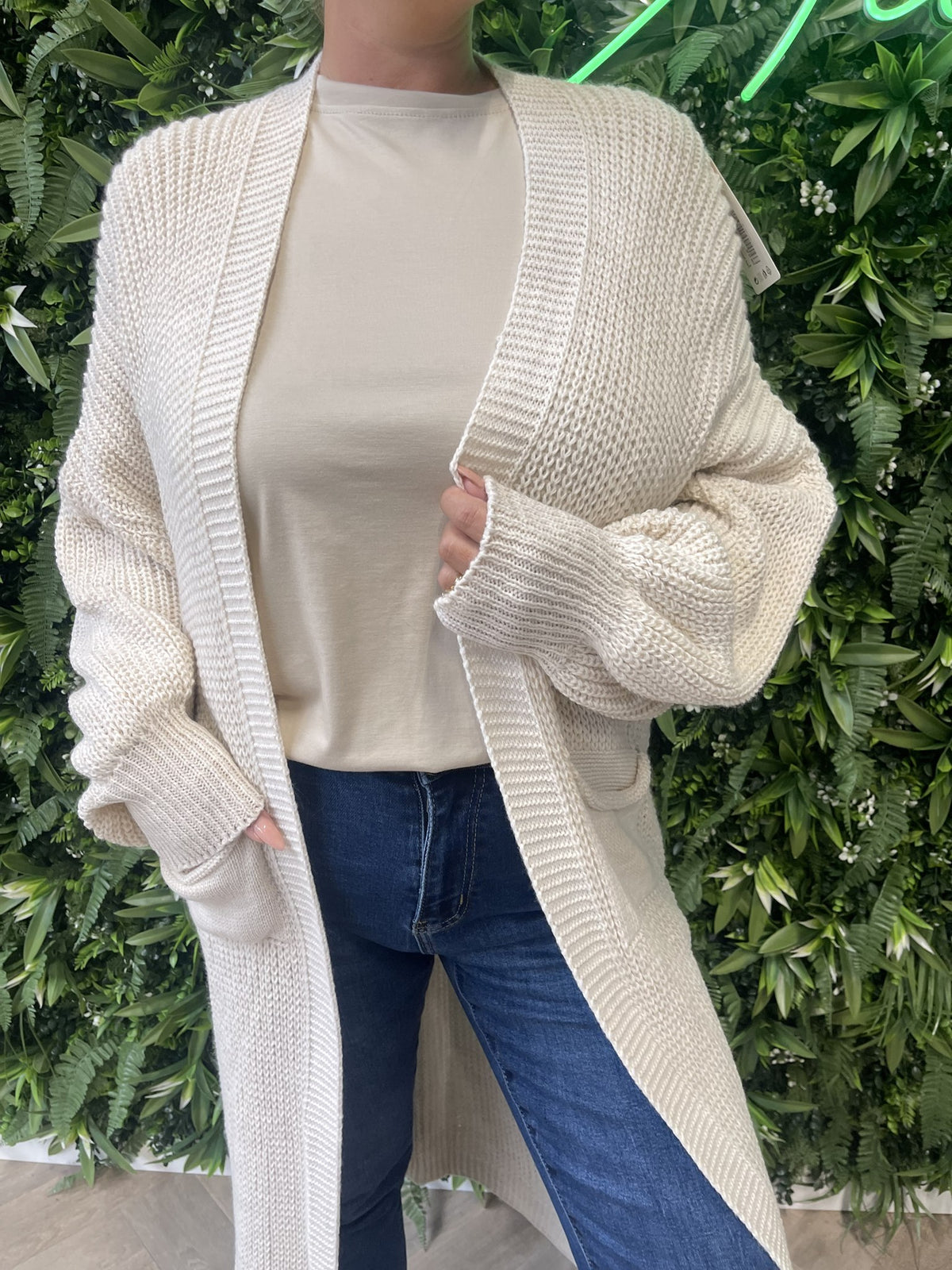Lang gebreid vest creme