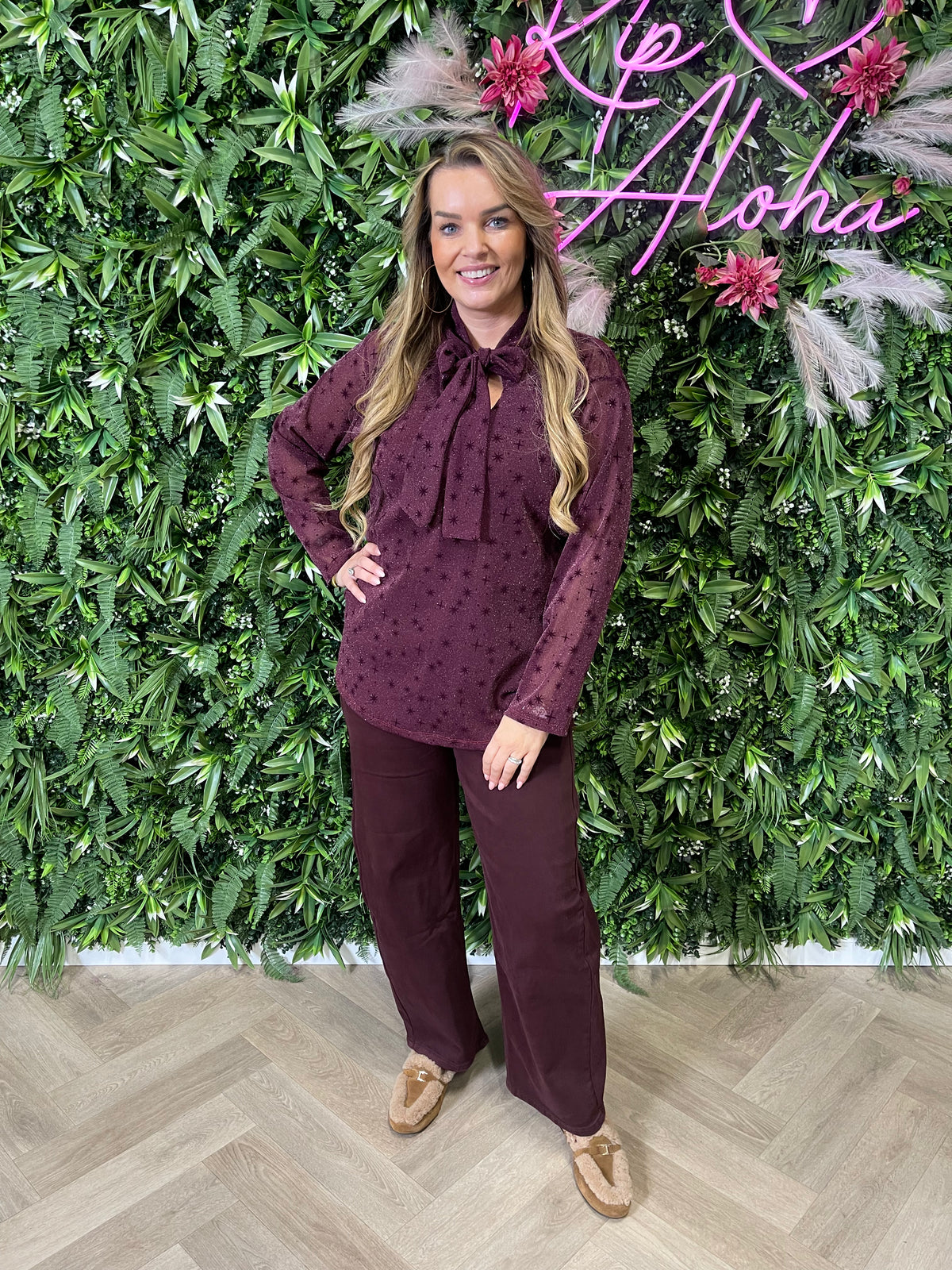Top lurex met strik aubergine