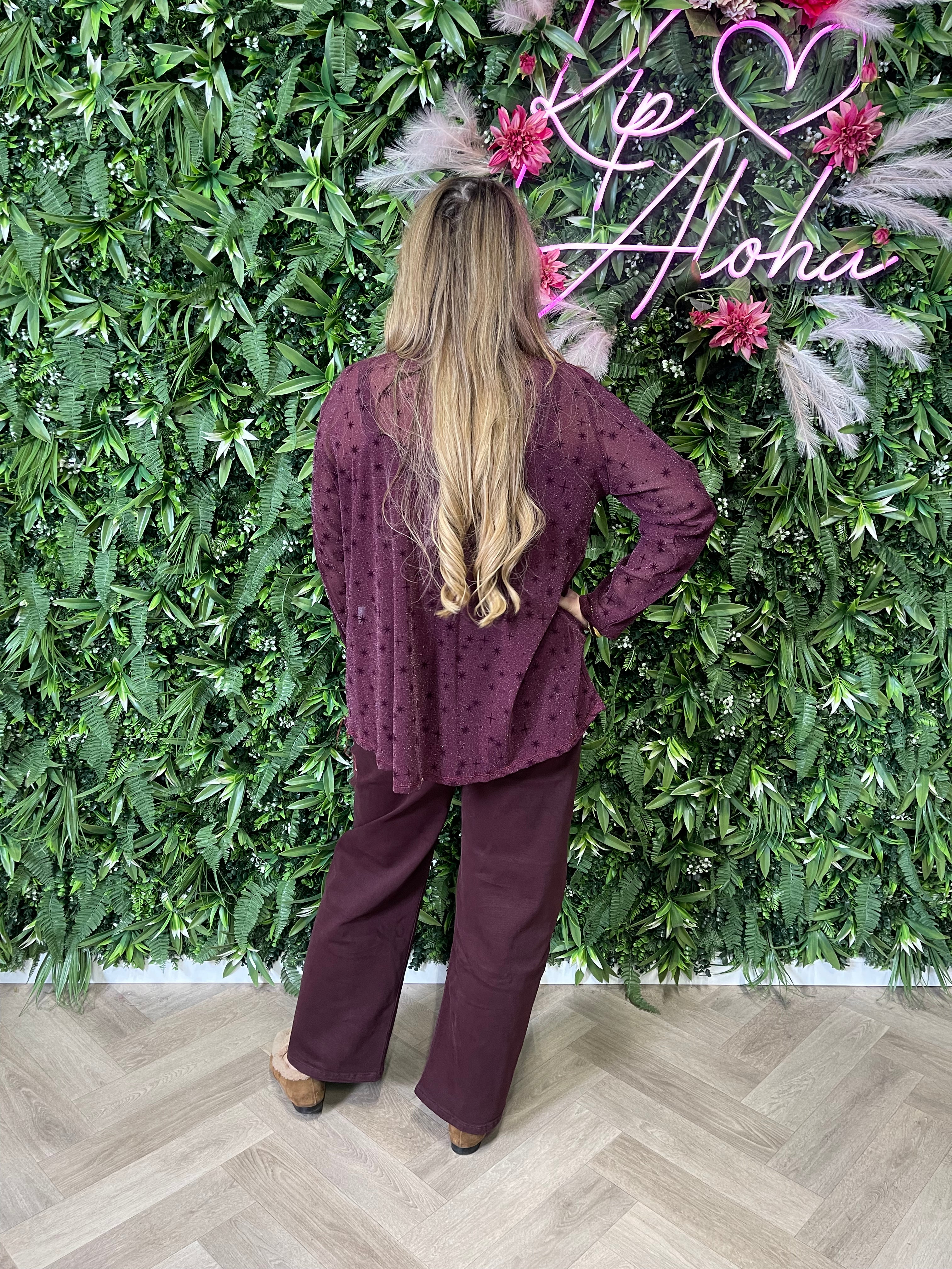 Top lurex met strik aubergine