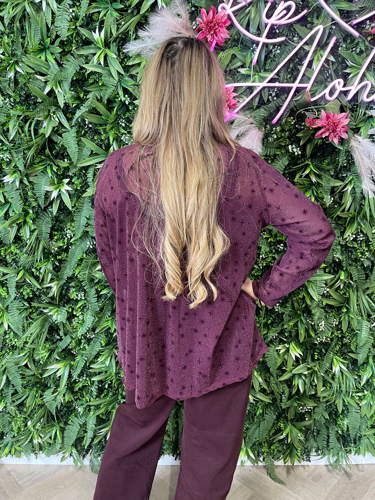Top lurex met strik aubergine