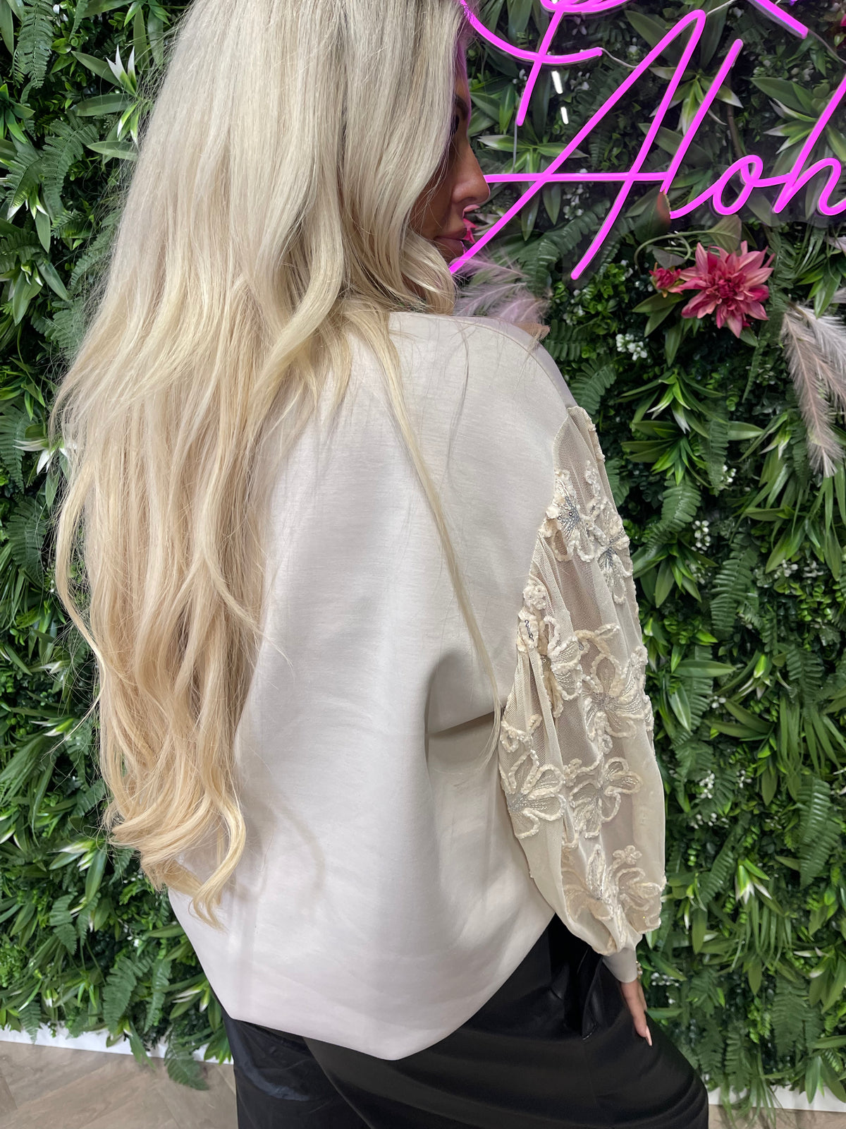 Sweater bloemmotief mouwen beige