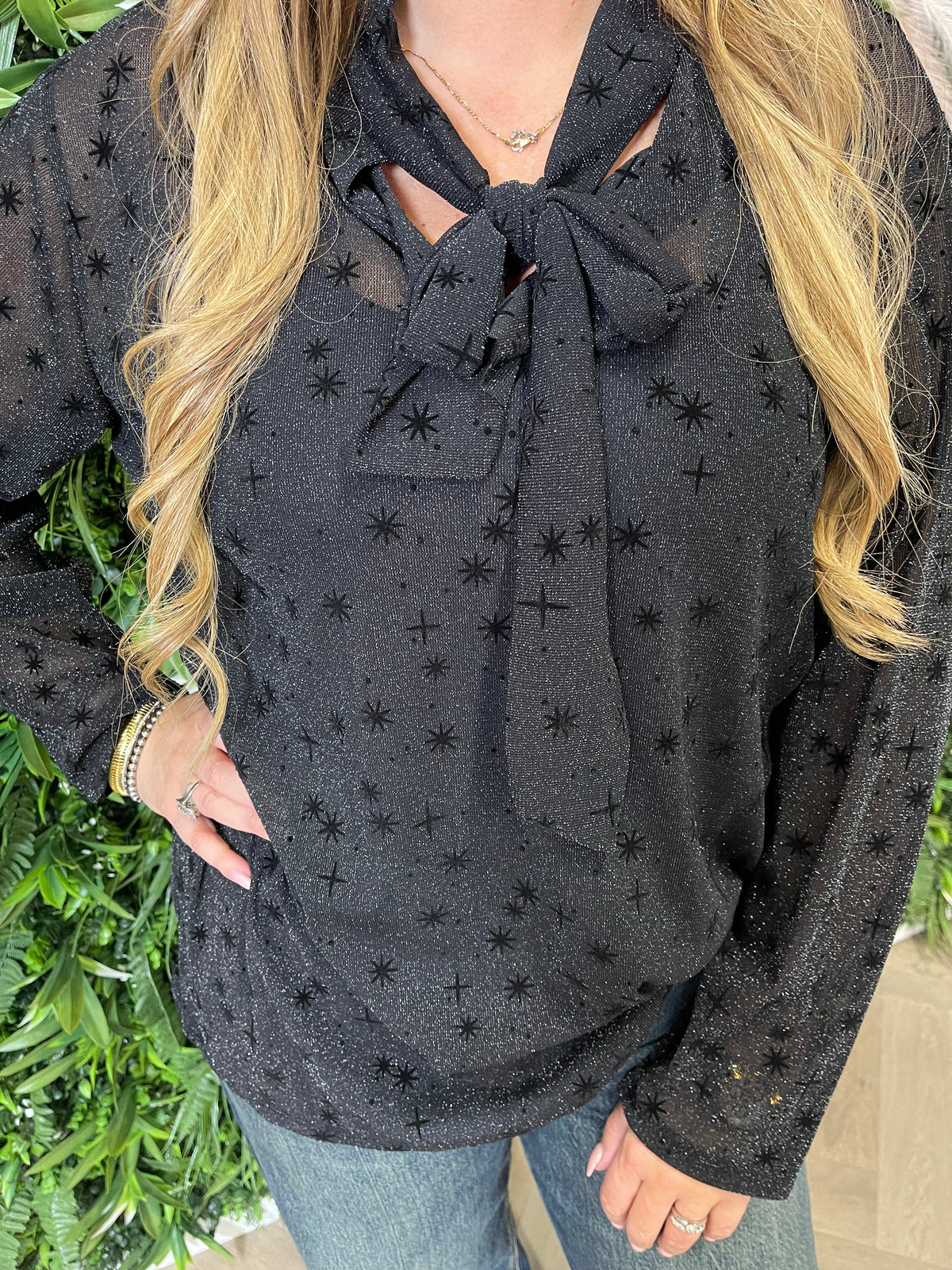 Top lurex met strik zwart