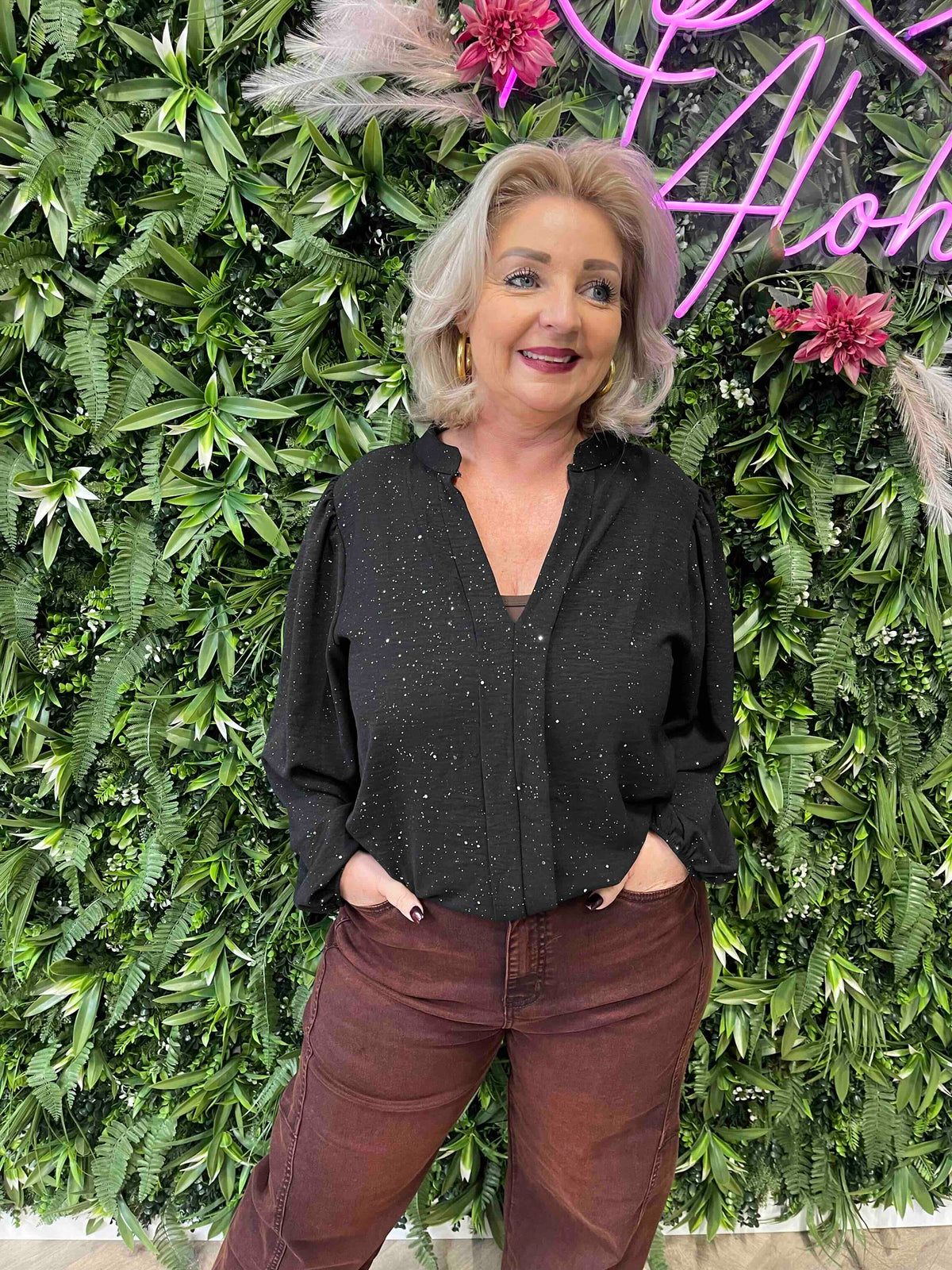 Blouse roezel met pofmouwen glitter zwart