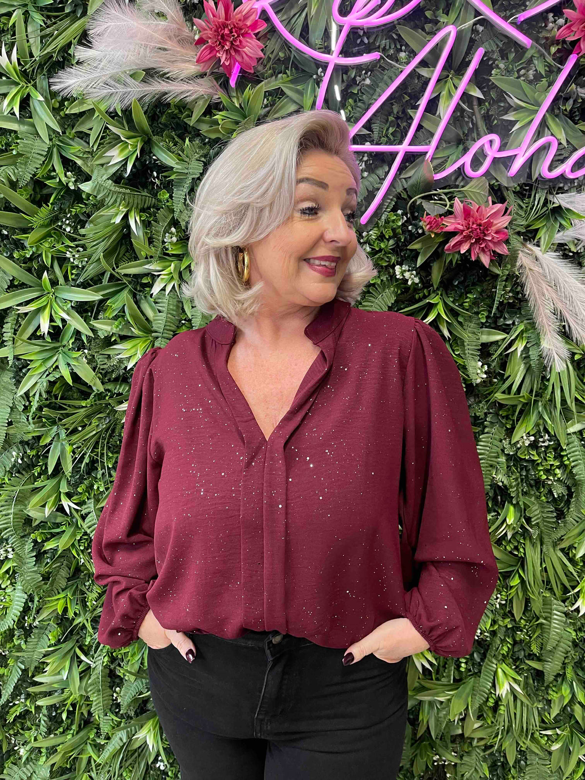 Blouse roezel met pofmouwen glitter bordeaux