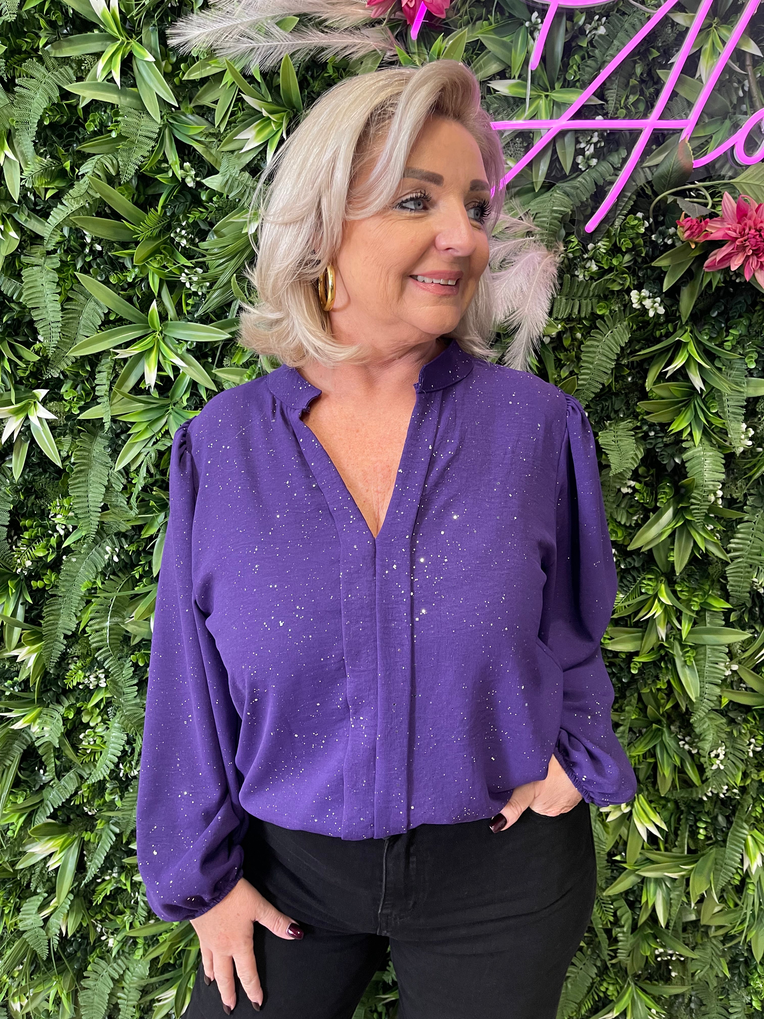 Blouse roezel met pofmouwen glitter paars