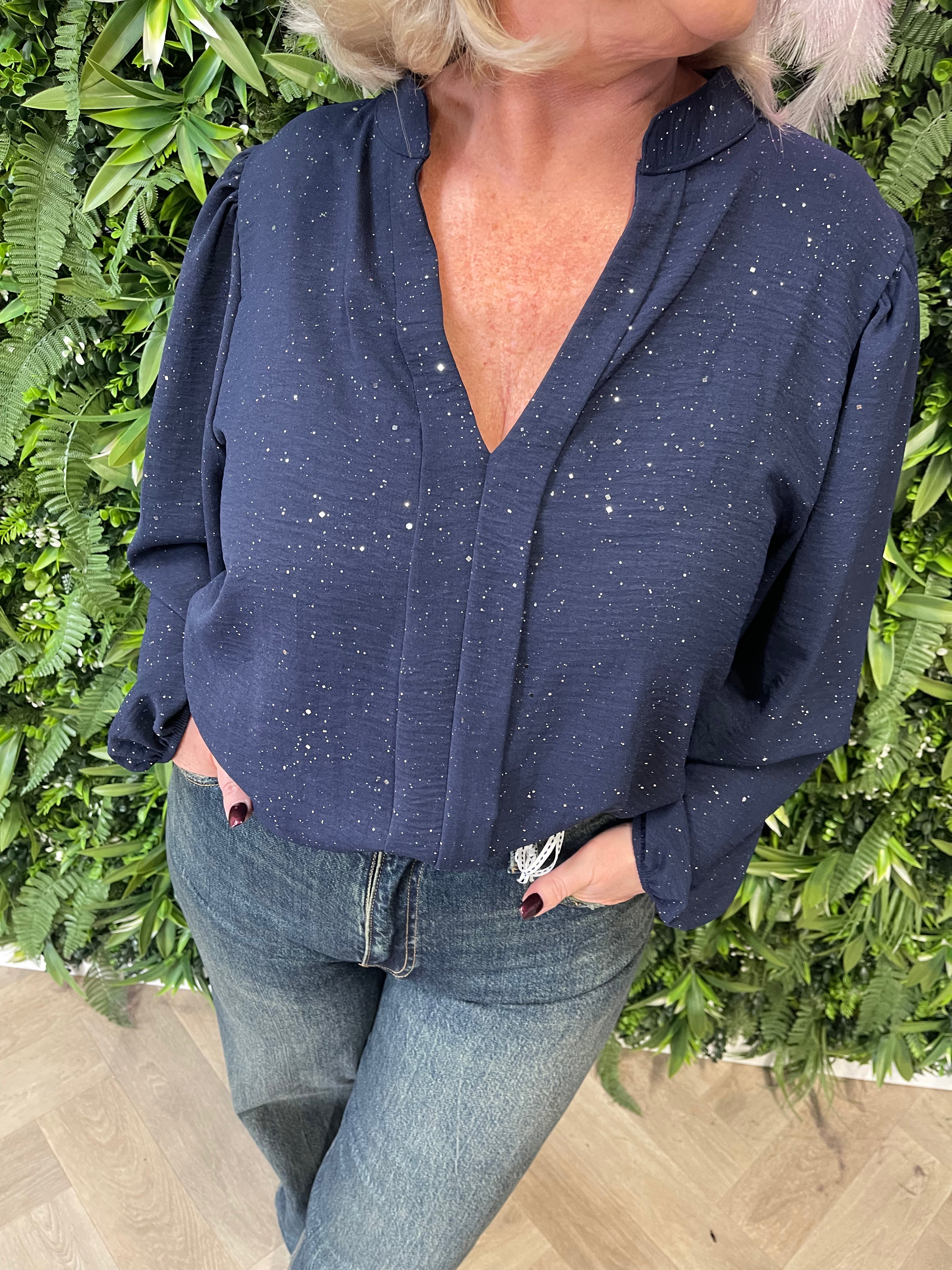 Blouse roezel met pofmouwen glitter marineblauw
