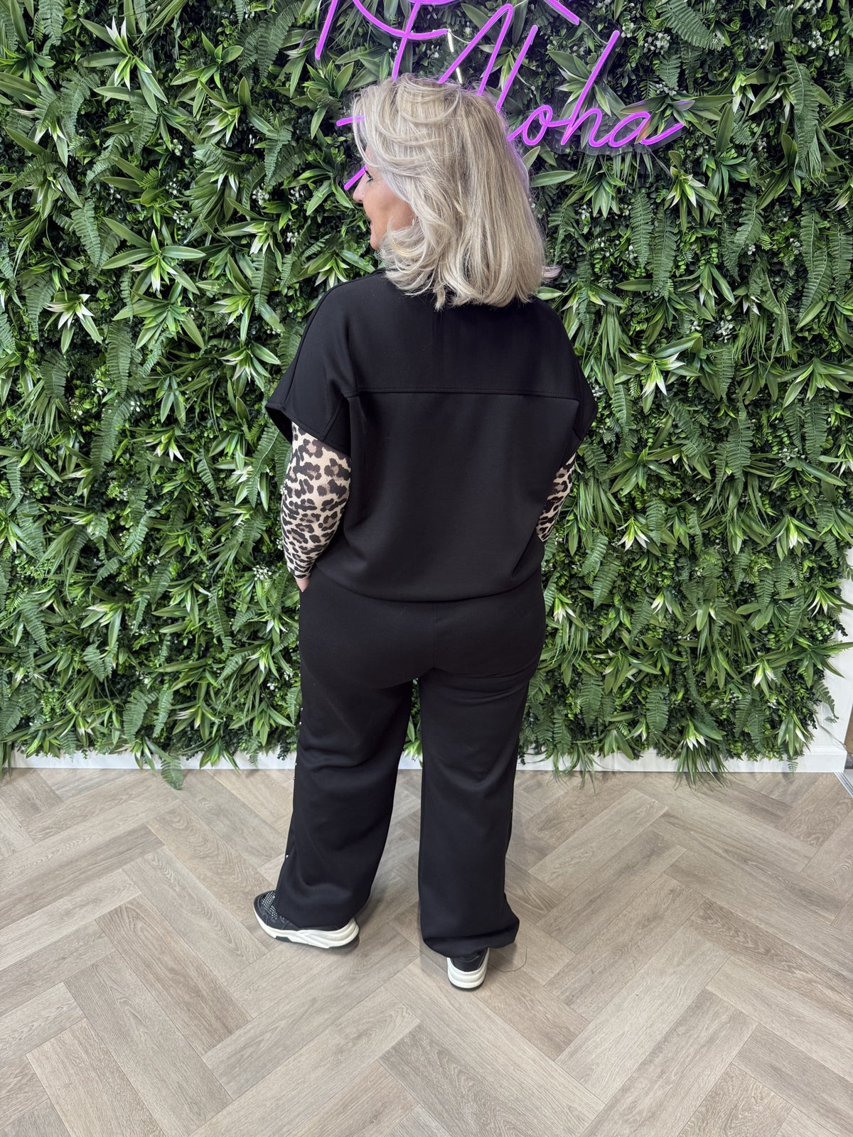 Tweedelig pak mouwloos met studs zwart