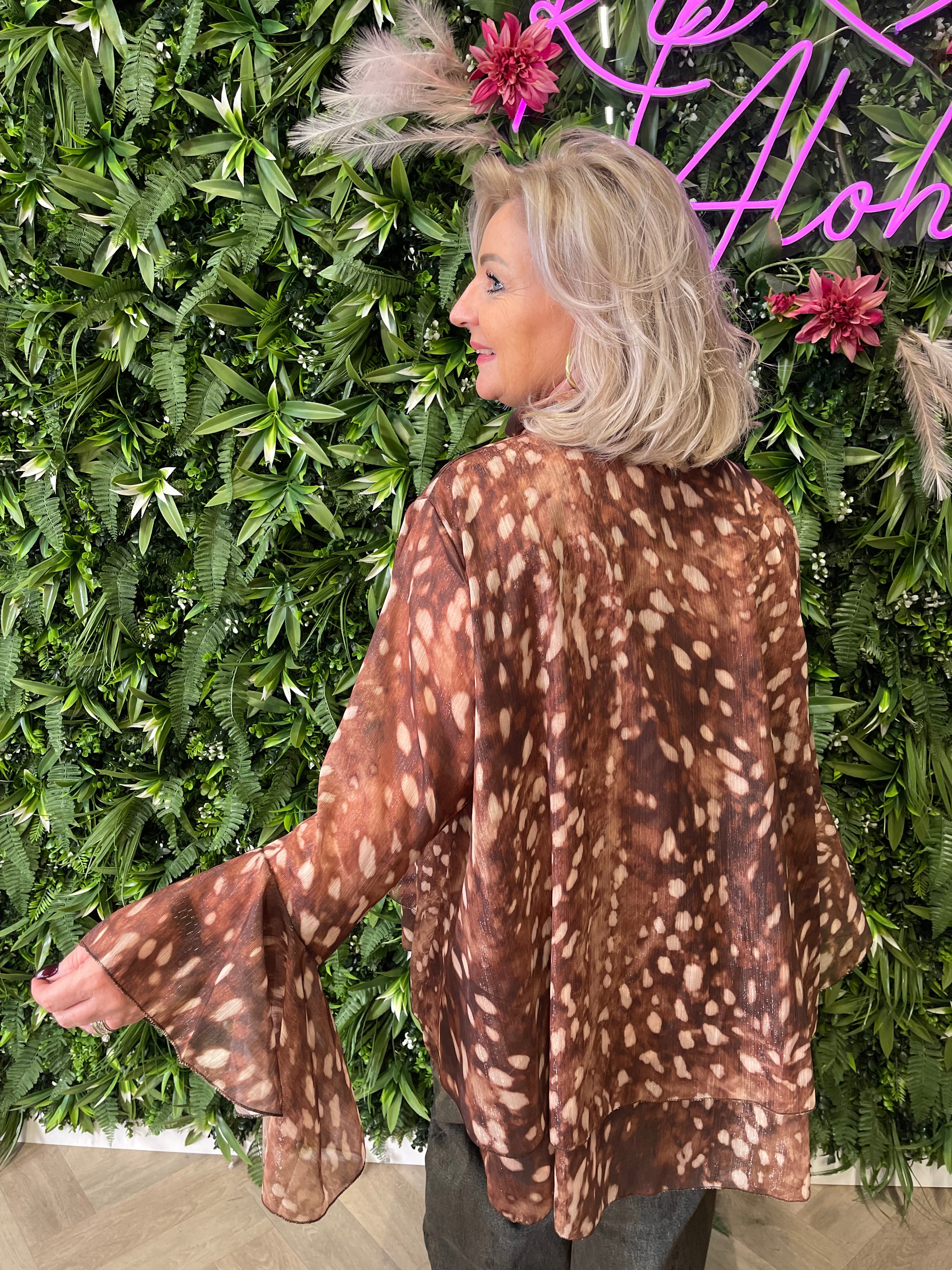 Blouse trompetmouwen print lichtbruin