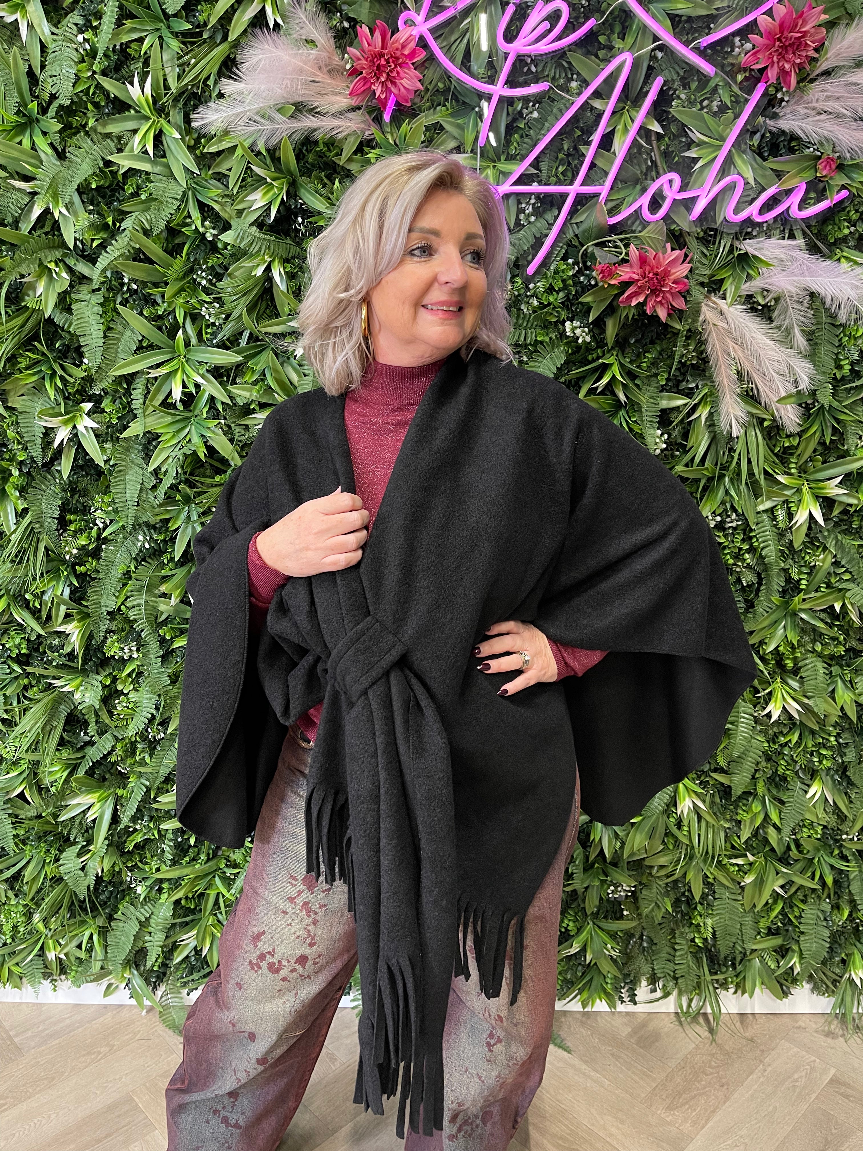 Poncho met franjes uni zwart