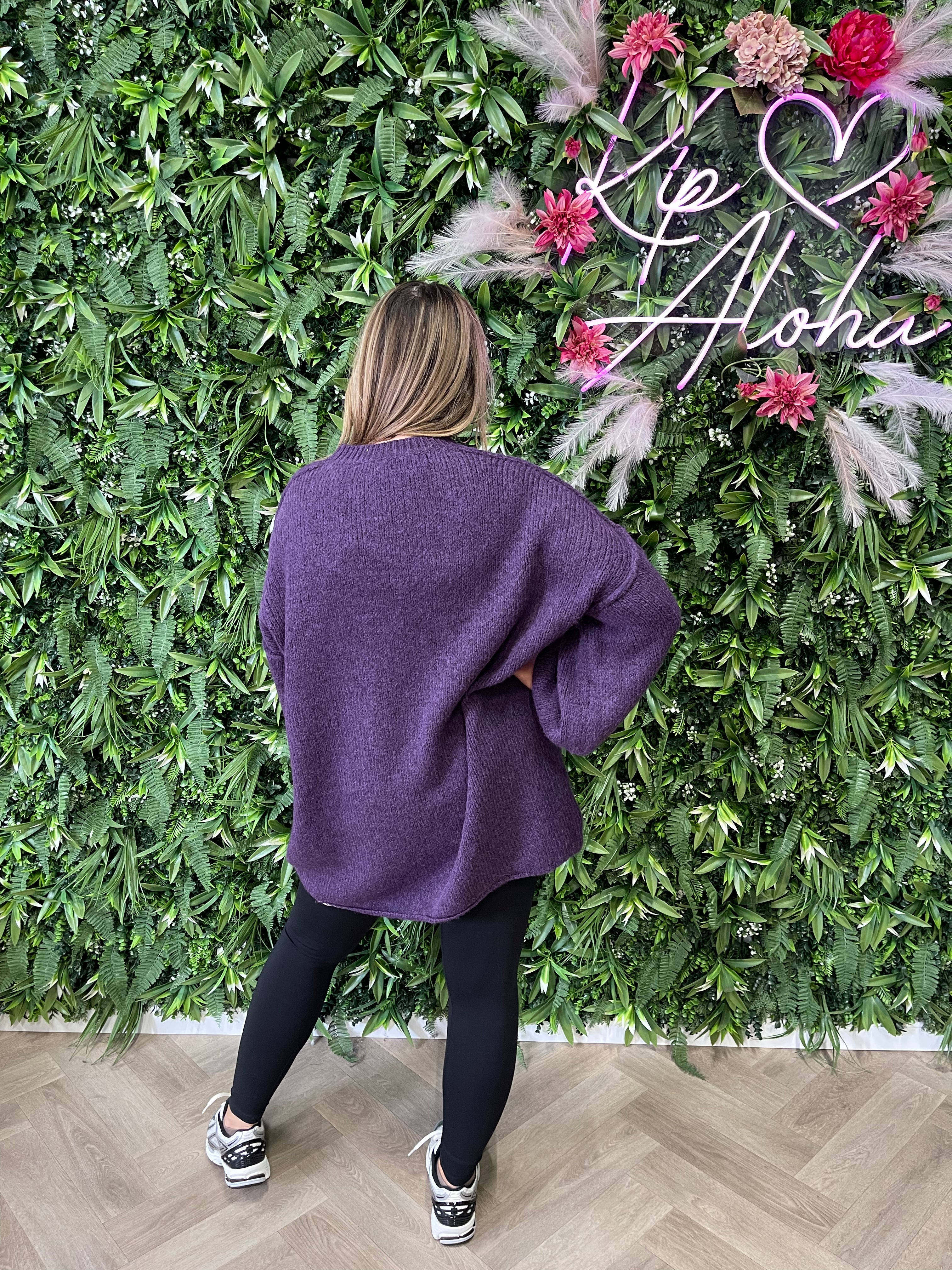 Gebreide trui met naad op de mouwen paars