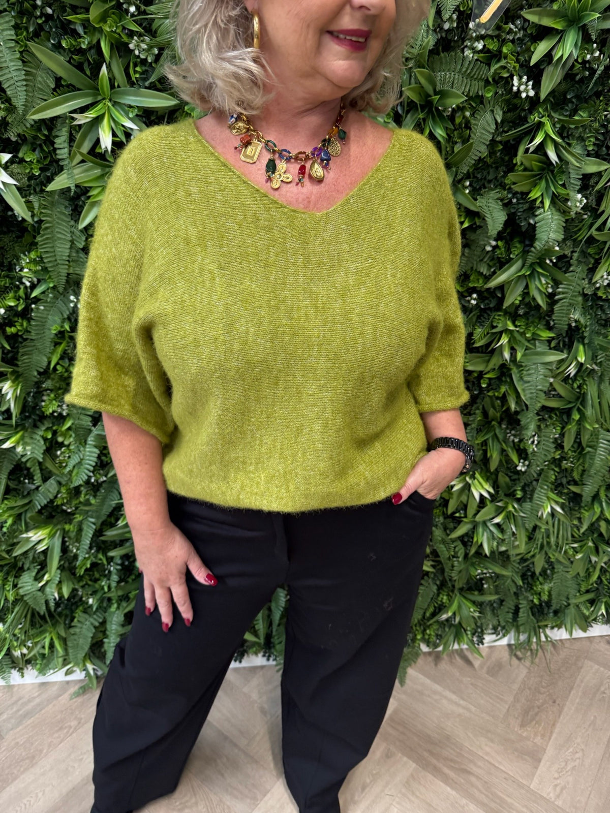 Gebreide trui v-hals korte mouwen pistache