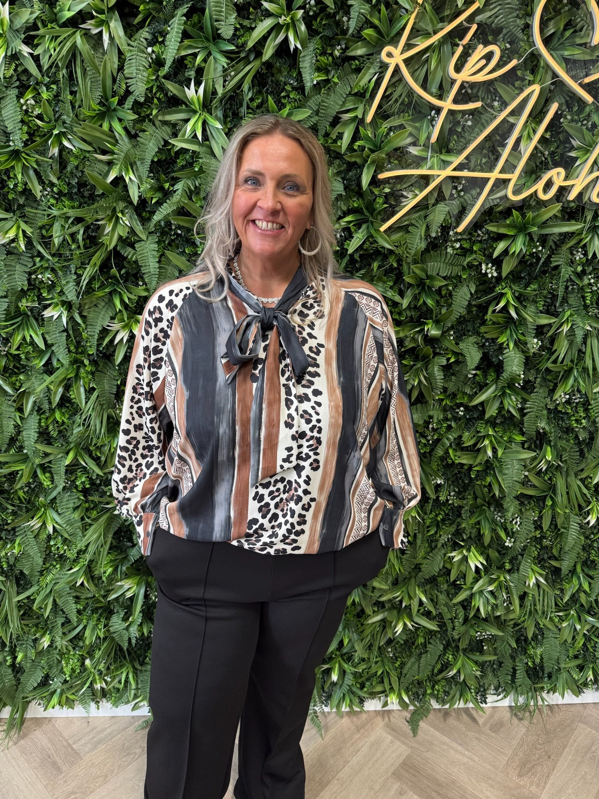 Blouse strik met strepen en panterprint zwart