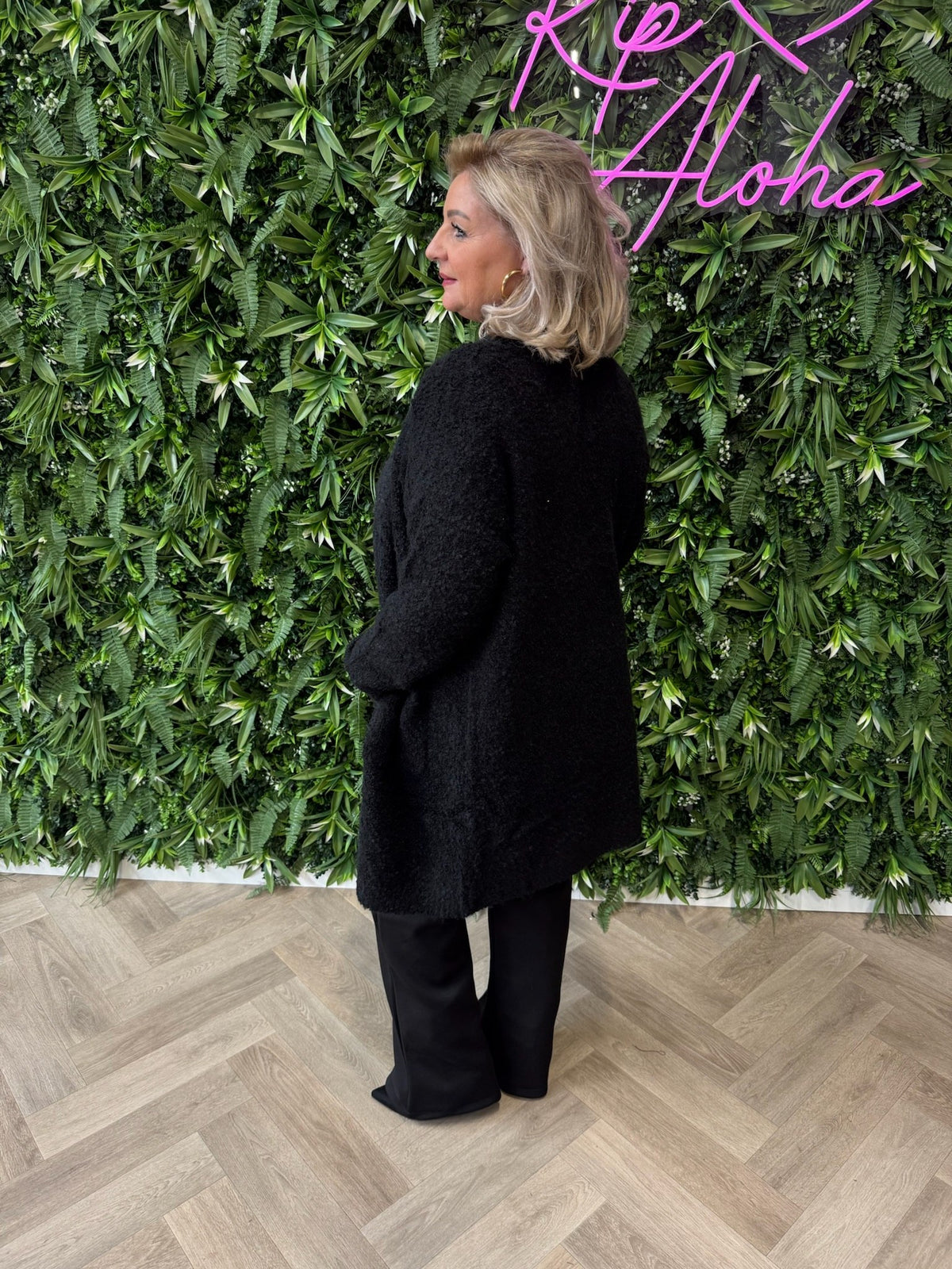 Half lang boucle vest zwart