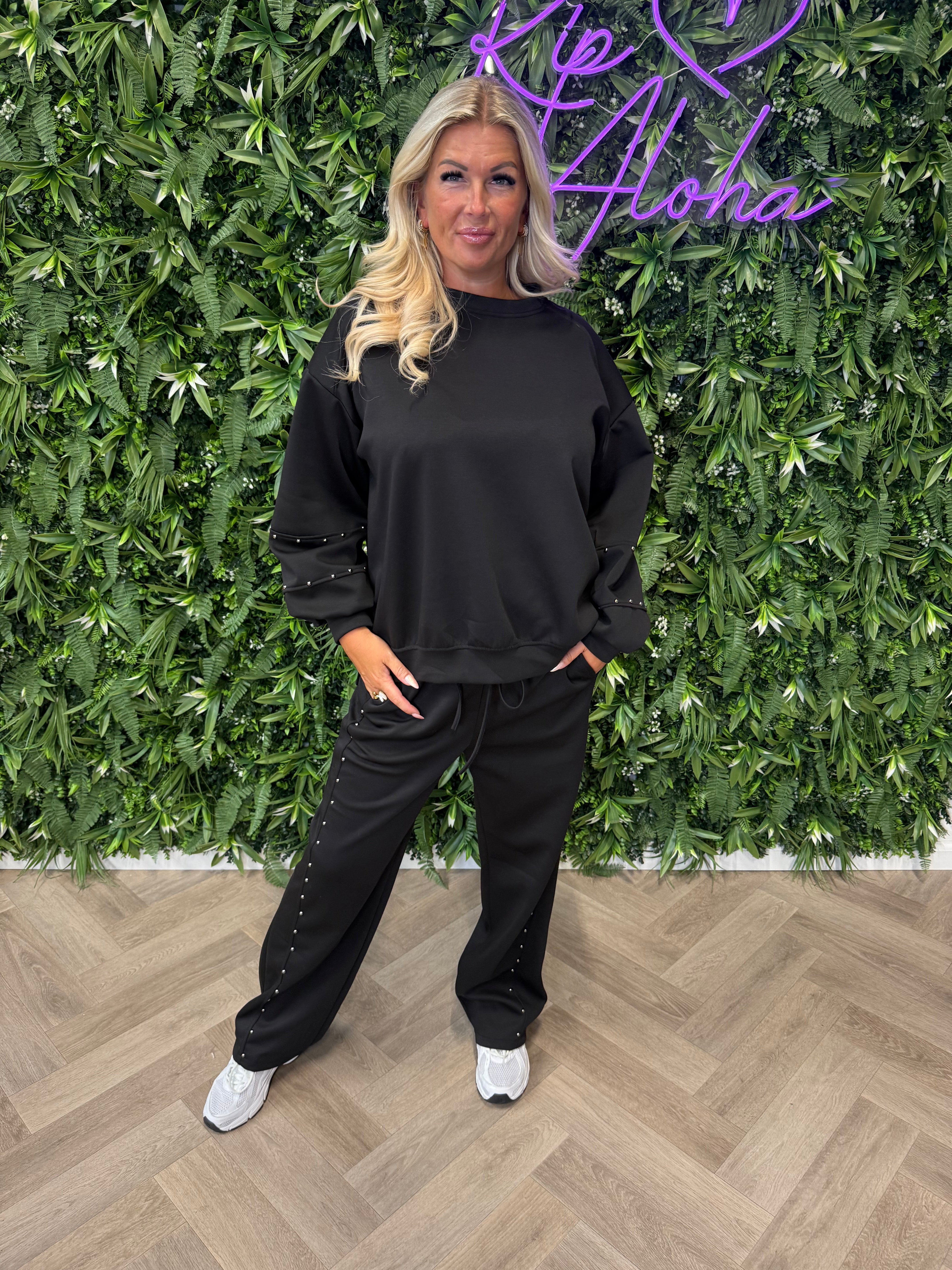 Tweedelig pak sweater pofmouwen studs zwart