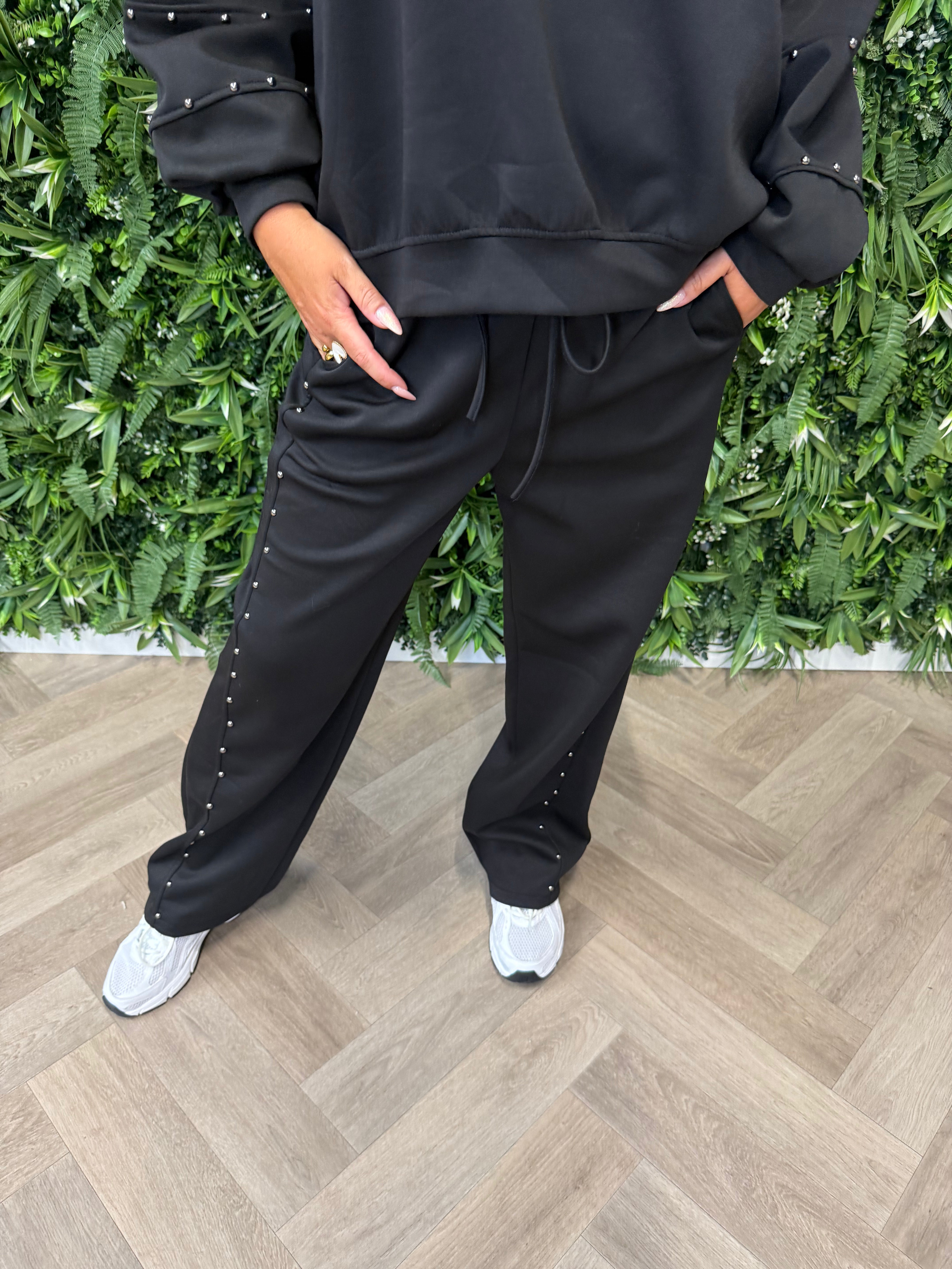 Tweedelig pak sweater pofmouwen studs zwart