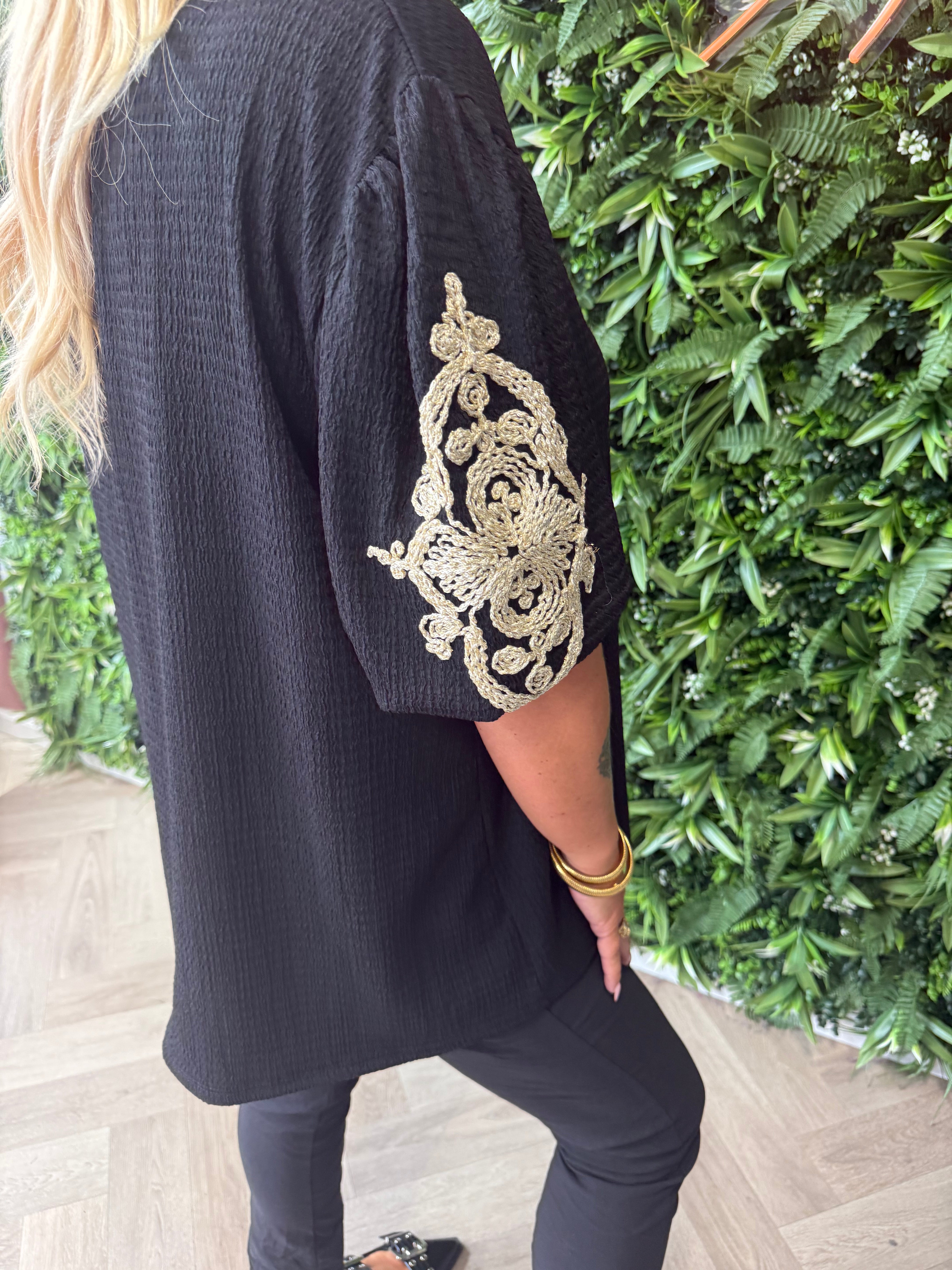 Crepe top korte pofmouwen zwart