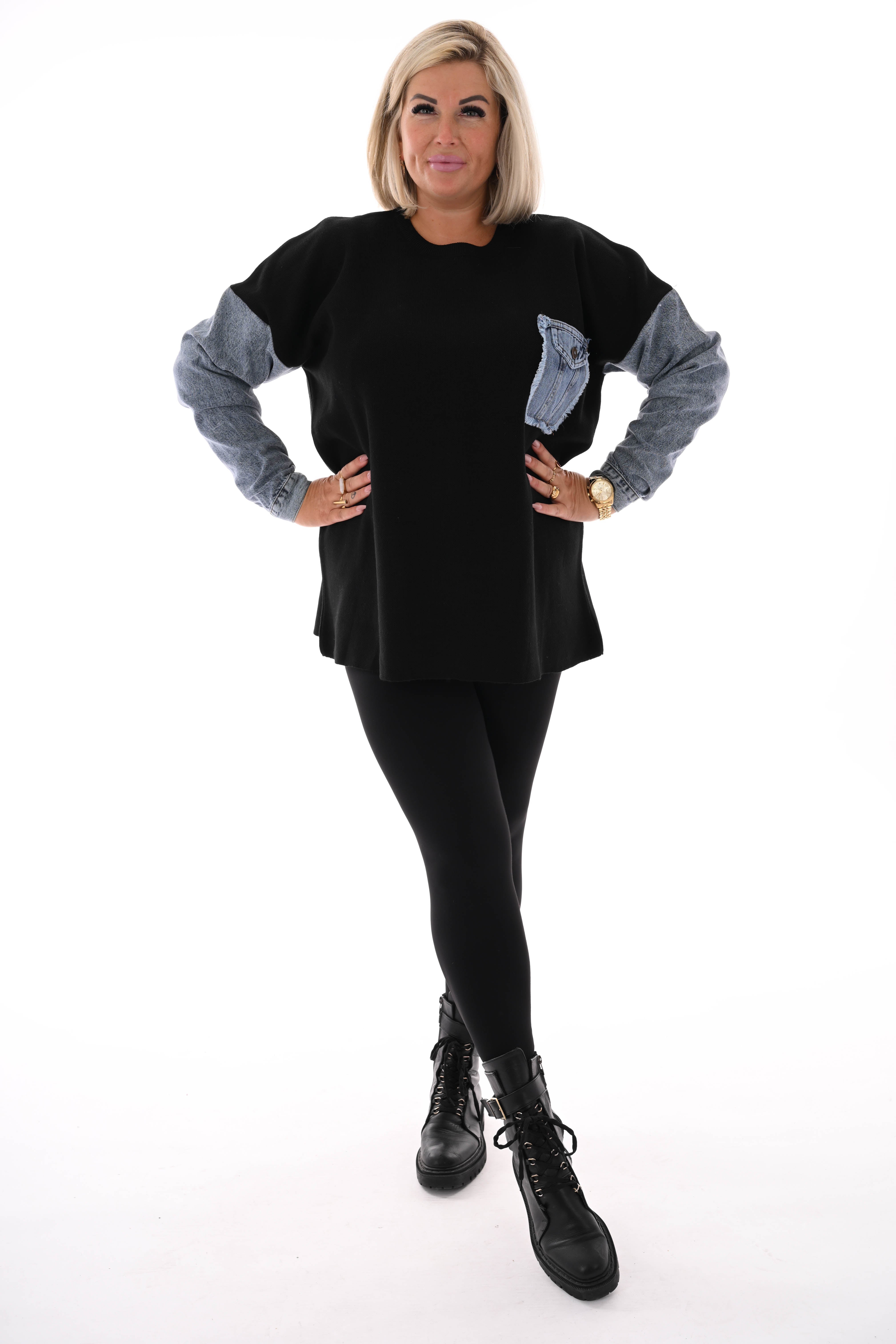 Gebreide trui met jeans zwart