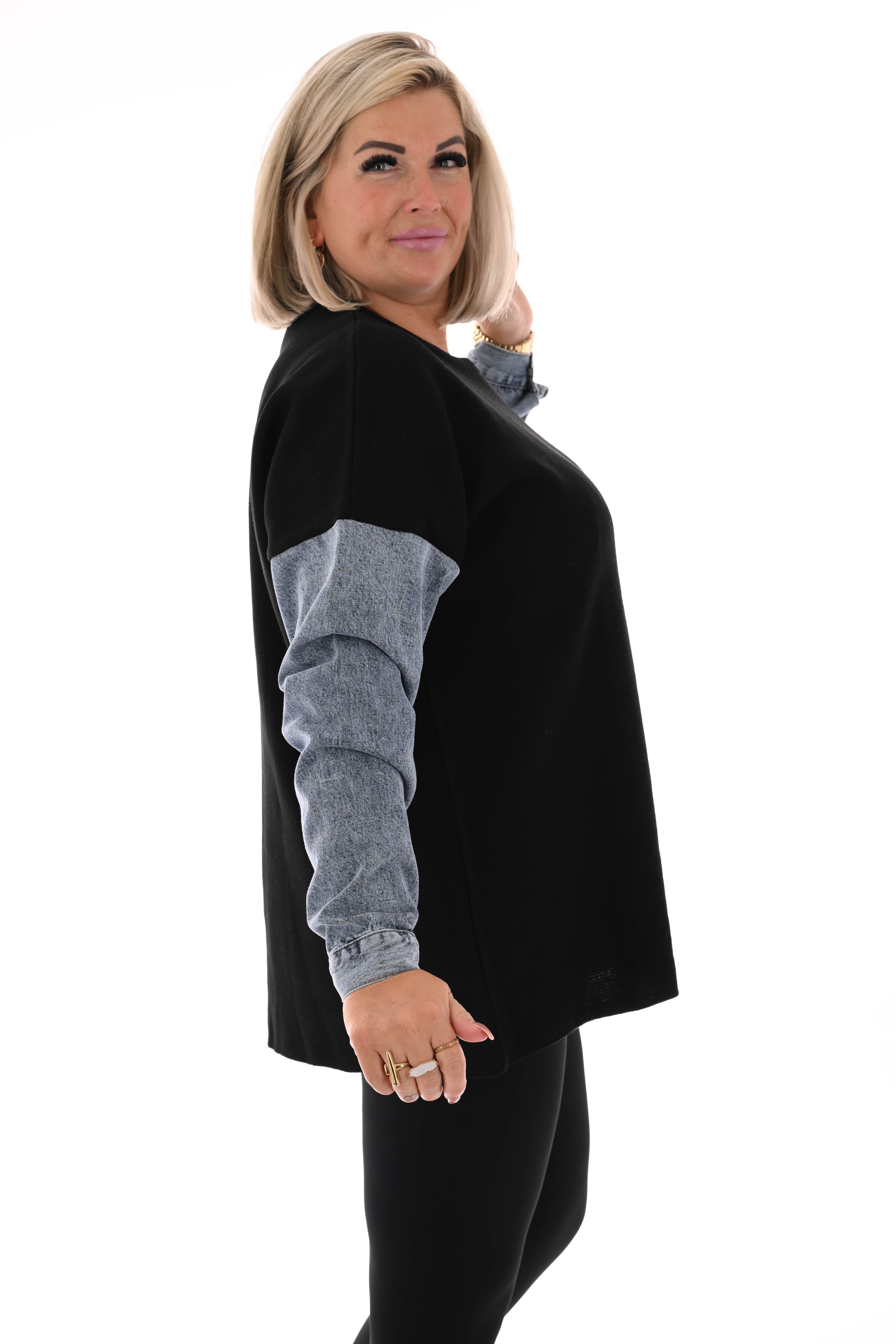 Gebreide trui met jeans zwart