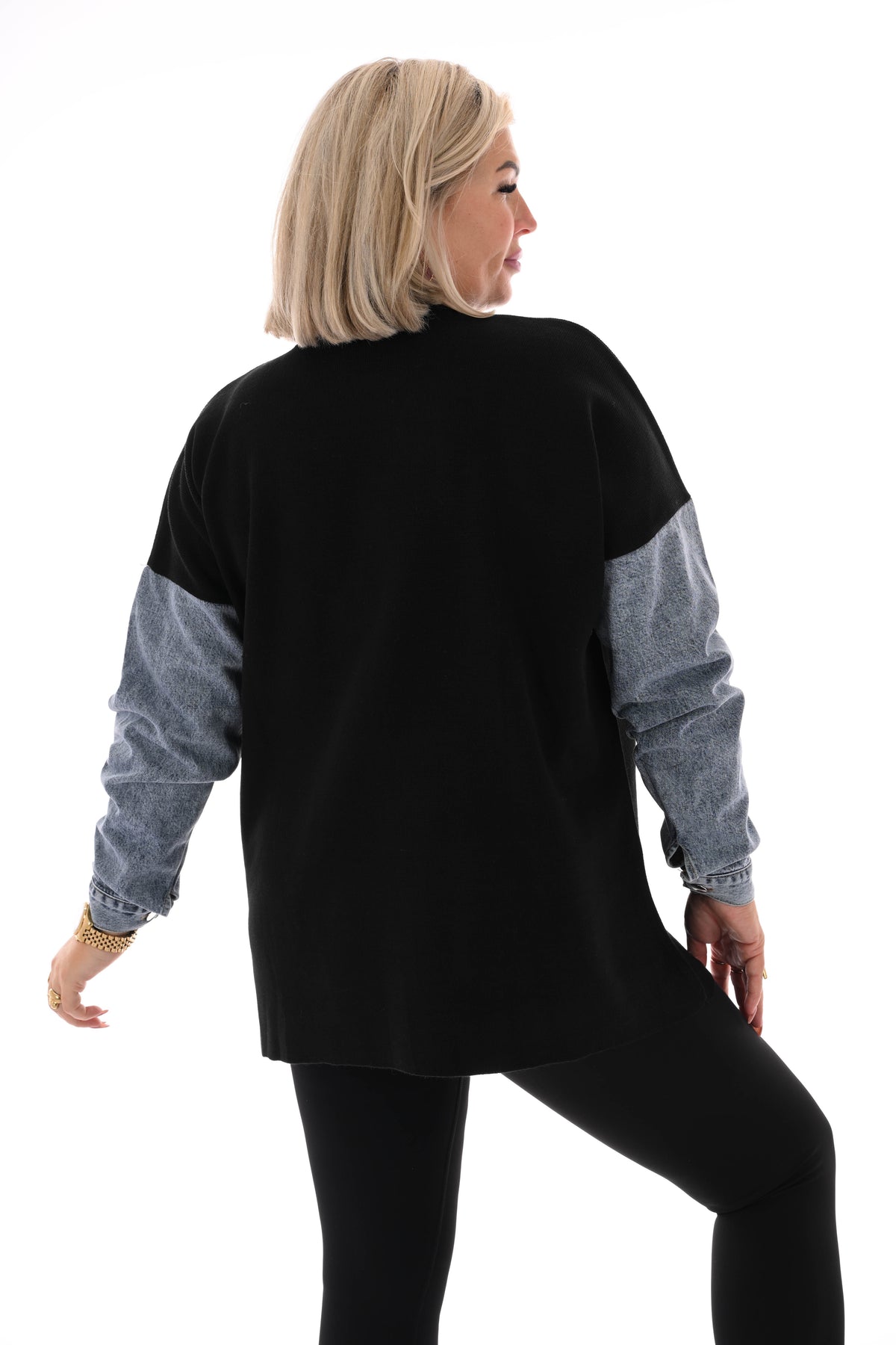 Gebreide trui met jeans zwart