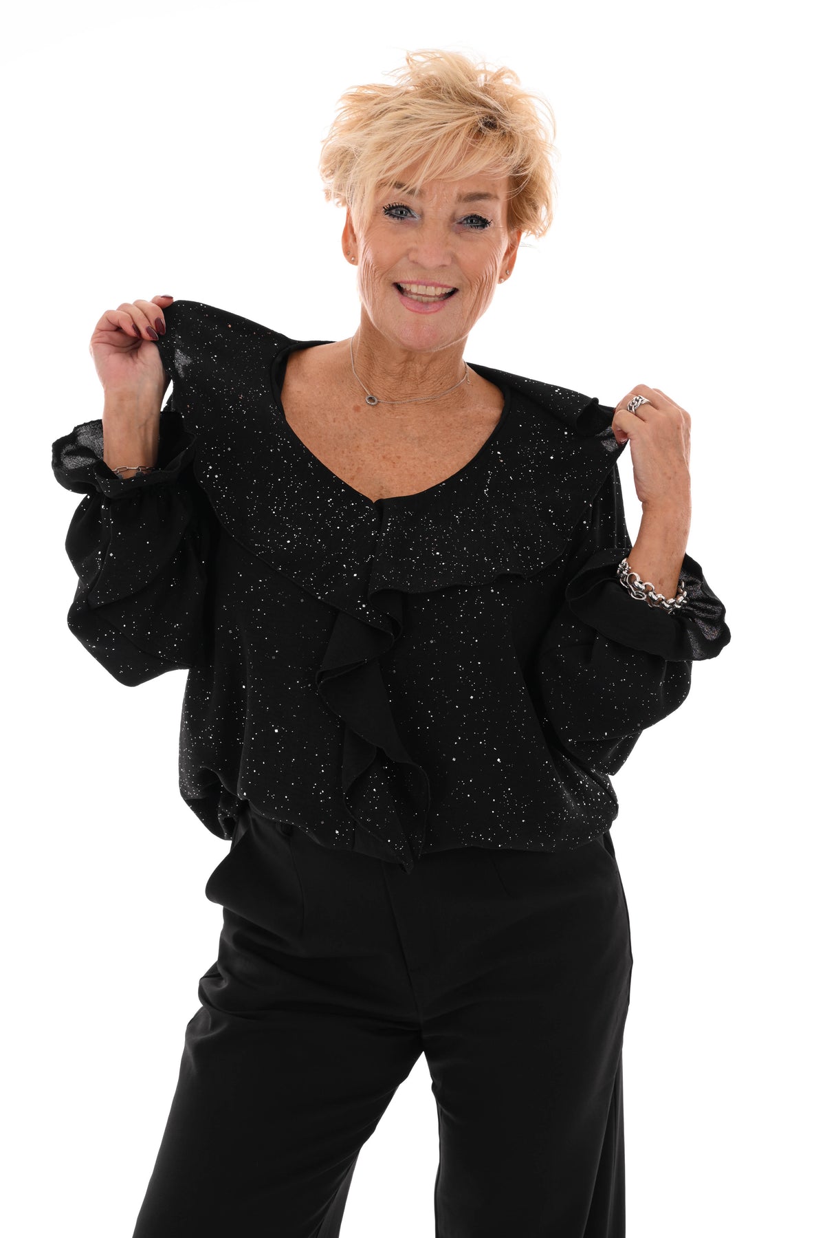 Blouse v-hals roezels glitter zwart