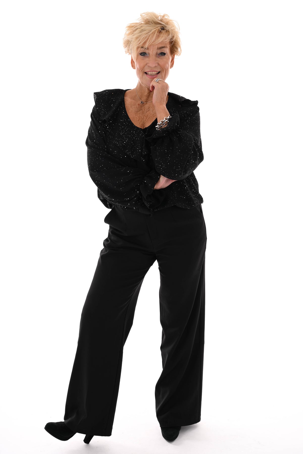 Blouse v-hals roezels glitter zwart